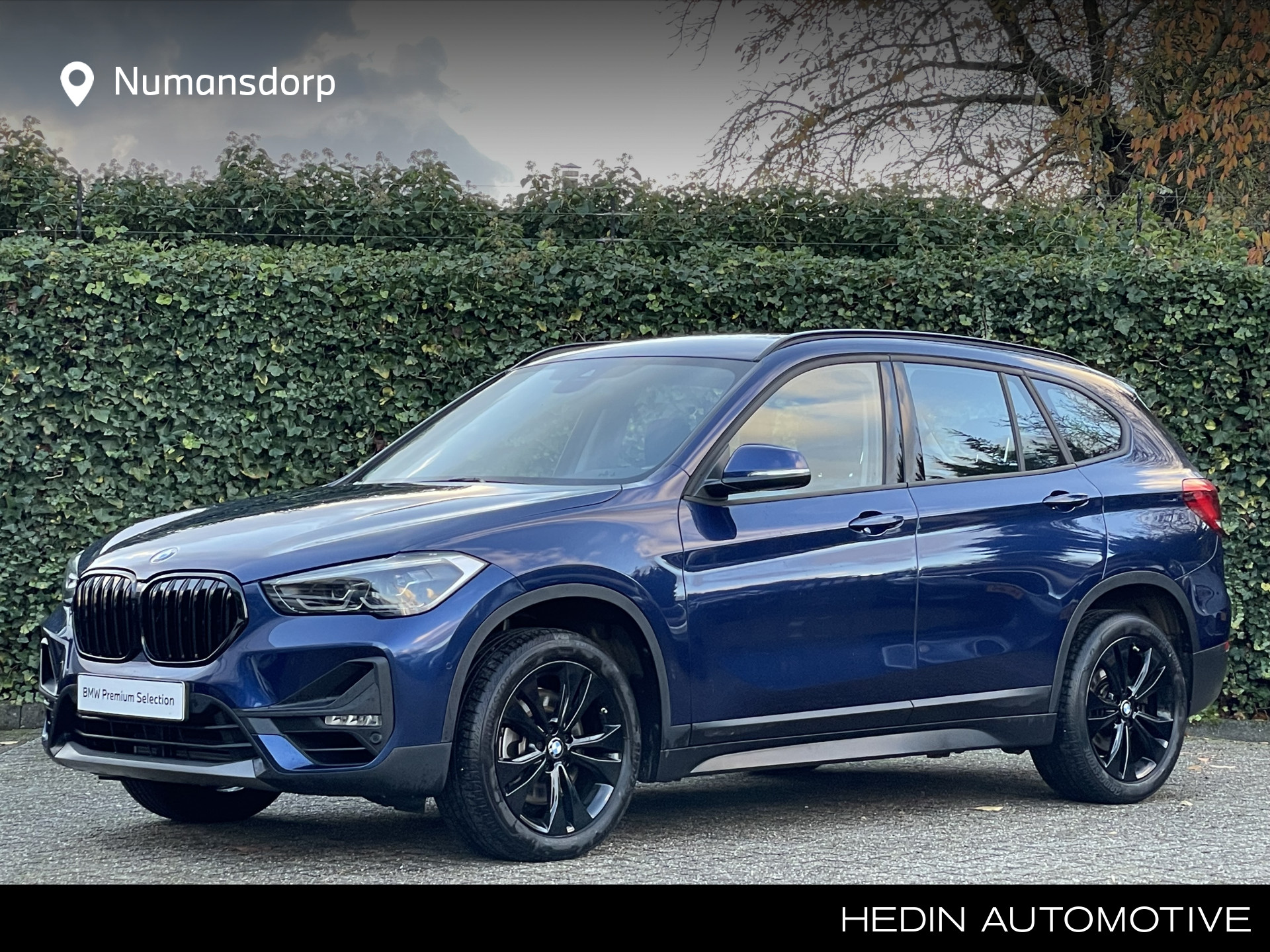 BMW X1 sDrive20i | Stoelverw. | Navi | Park. Ass. | Trekhaak | Lendensteun | 18" Jet Black