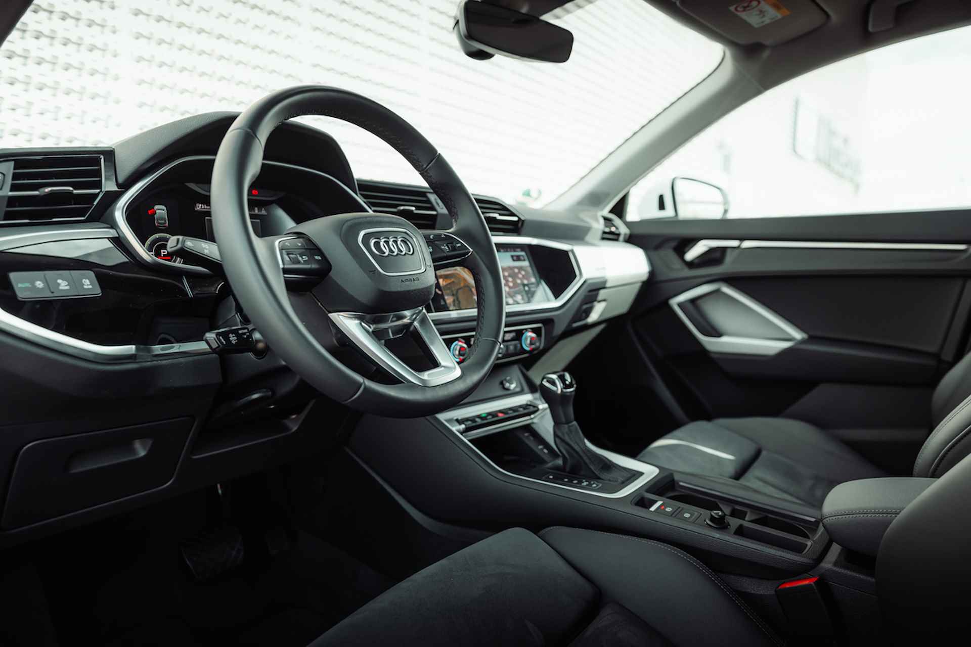 Audi Q3 Sportback 45 TFSI e 245pk s-tronic Advanced | 19" LM velgen | Leder-Dinamica | Sportstoelen | Matrix | Homelink | Camera | Adaptive cruise control - 16/33