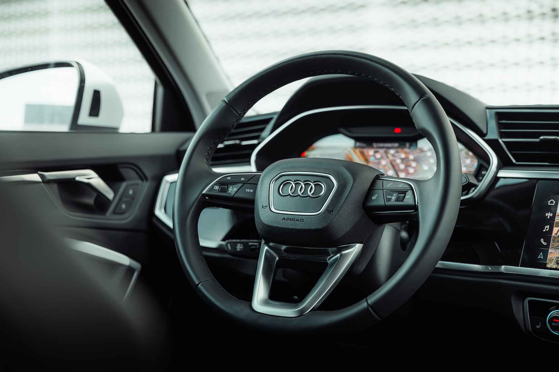 Audi Q3 Sportback 45 TFSI e 245pk s-tronic Advanced | 19" LM velgen | Leder-Dinamica | Sportstoelen | Matrix | Homelink | Camera | Adaptive cruise control - 22/33