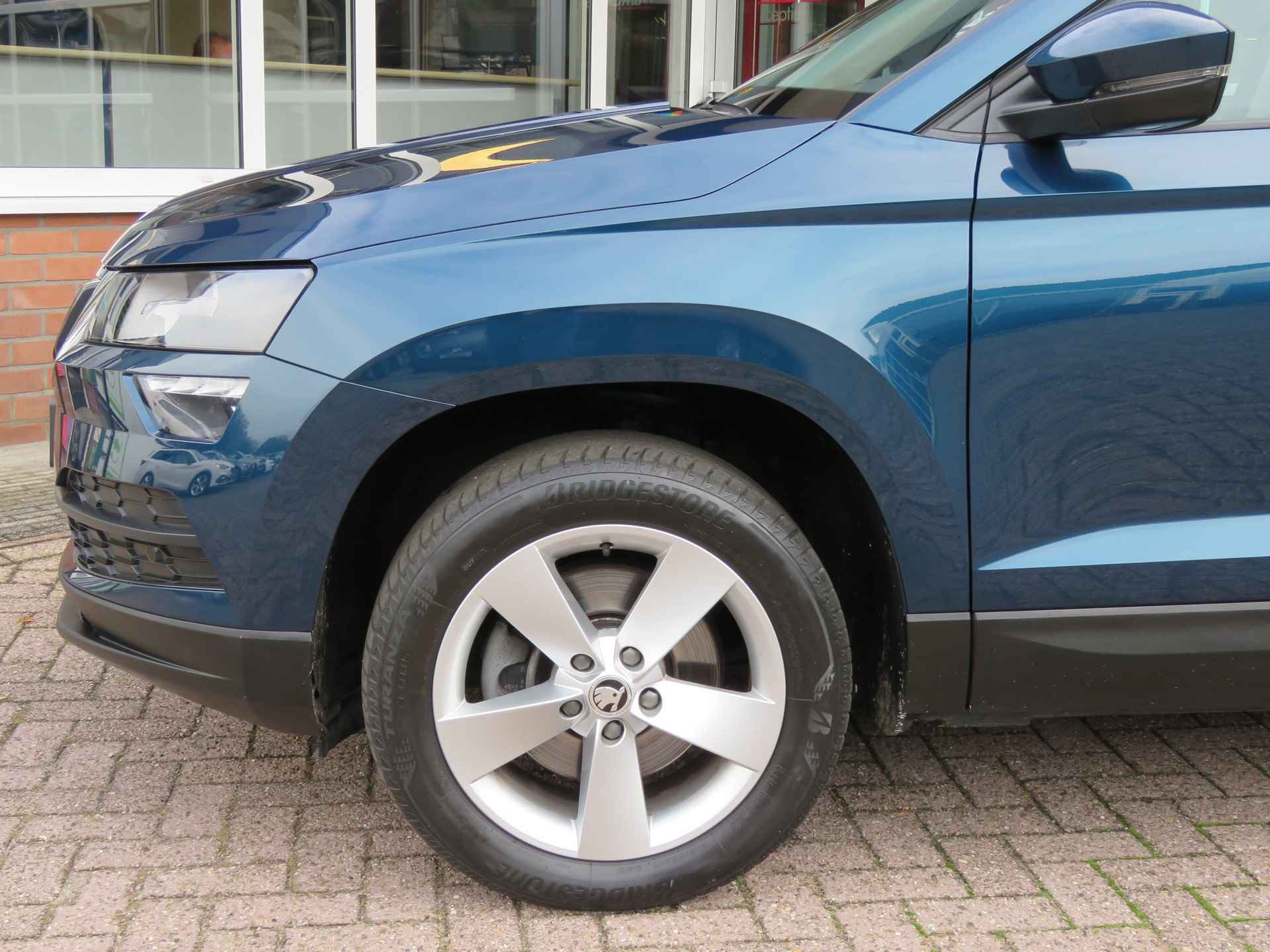 Škoda Karoq 1.0 TSI 115PK DSG-Aut. Ambition / Camera / Weg.klap haak / Elec klep / BOVAG garantie - 13/56