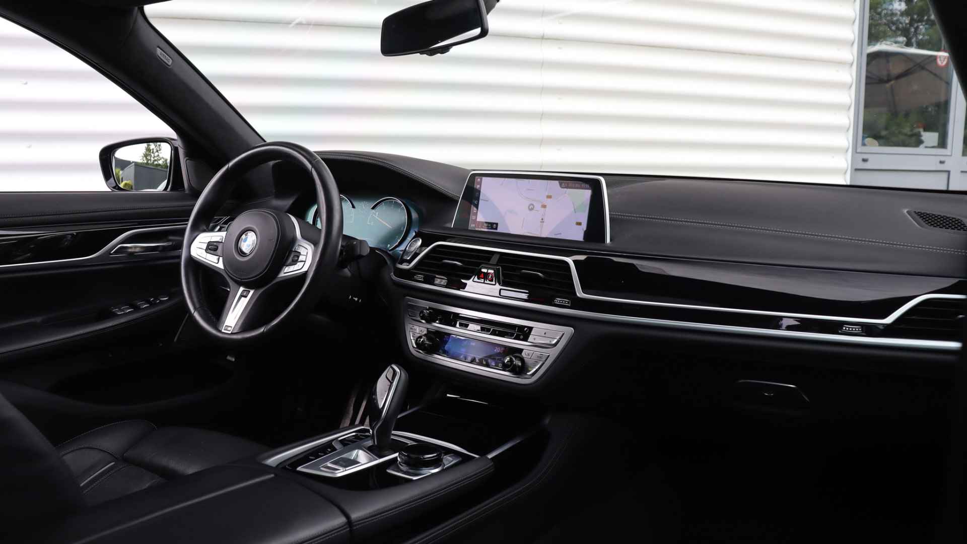 BMW 7 Serie 750i xDrive High Executive M-Sport | Massage | Harman/Kardon | Schuifdak | Head-up | Stoelventilatie | Laserlight | Achterasbesturing - 49/50