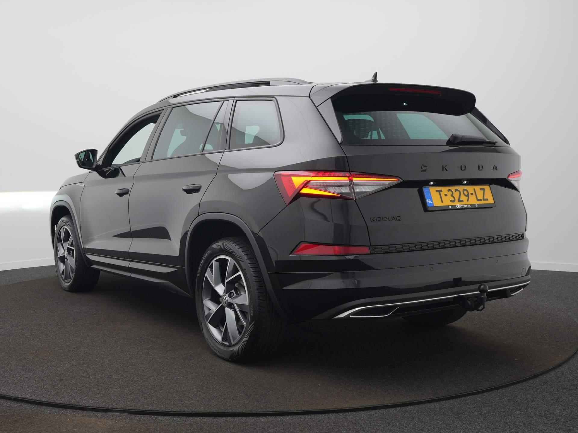 Skoda Kodiaq 1.5 TSI Sportline Business 7p. DSG / Panodak / Elek. Trekhaak / Adap. Cruise / Elek. Stoel - 7/74