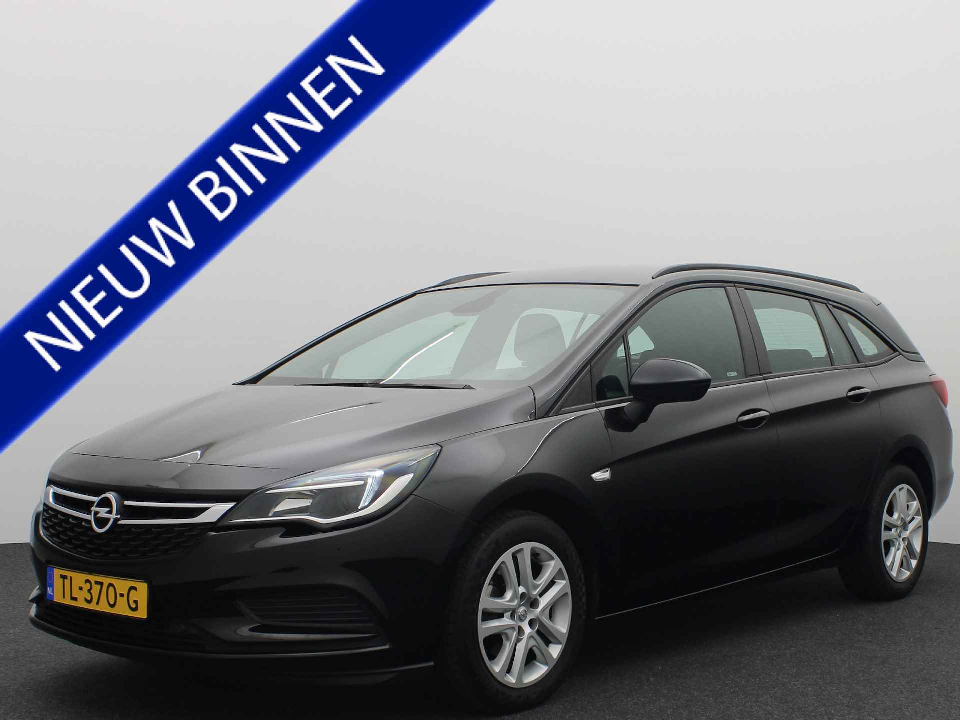 Opel Astra Sports Tourer 1.0 Online Edition CARPLAY / NAVI / AIRCO / CRUISE / PDC / BLUETOOTH / DAB+ / NL-AUTO - 1/44