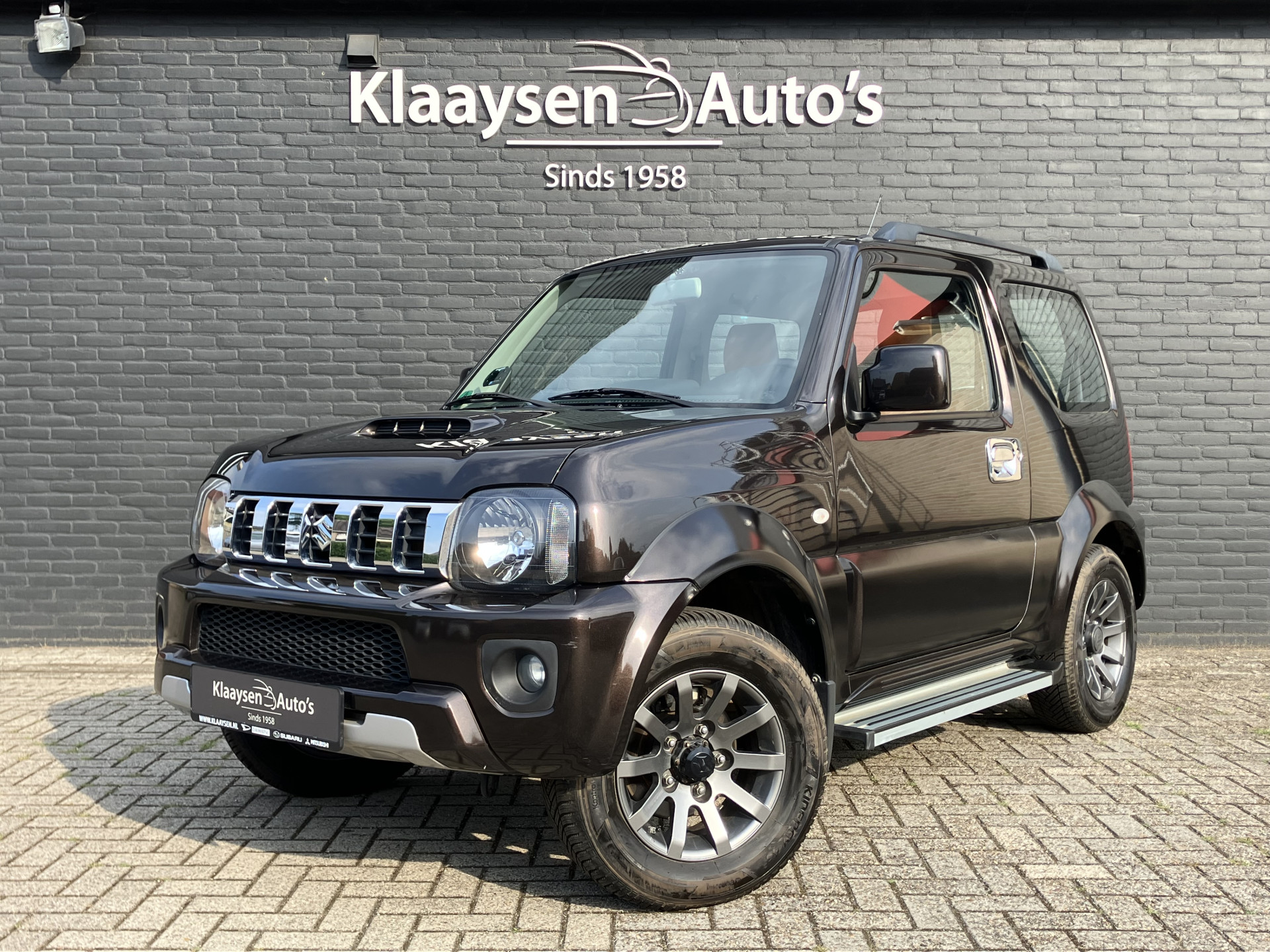 Suzuki Jimny 1.3 4WD Exclusive AUT. | dealer onderhouden | airco | navigatie | leder/alcantara bekleding | trekhaak | carplay