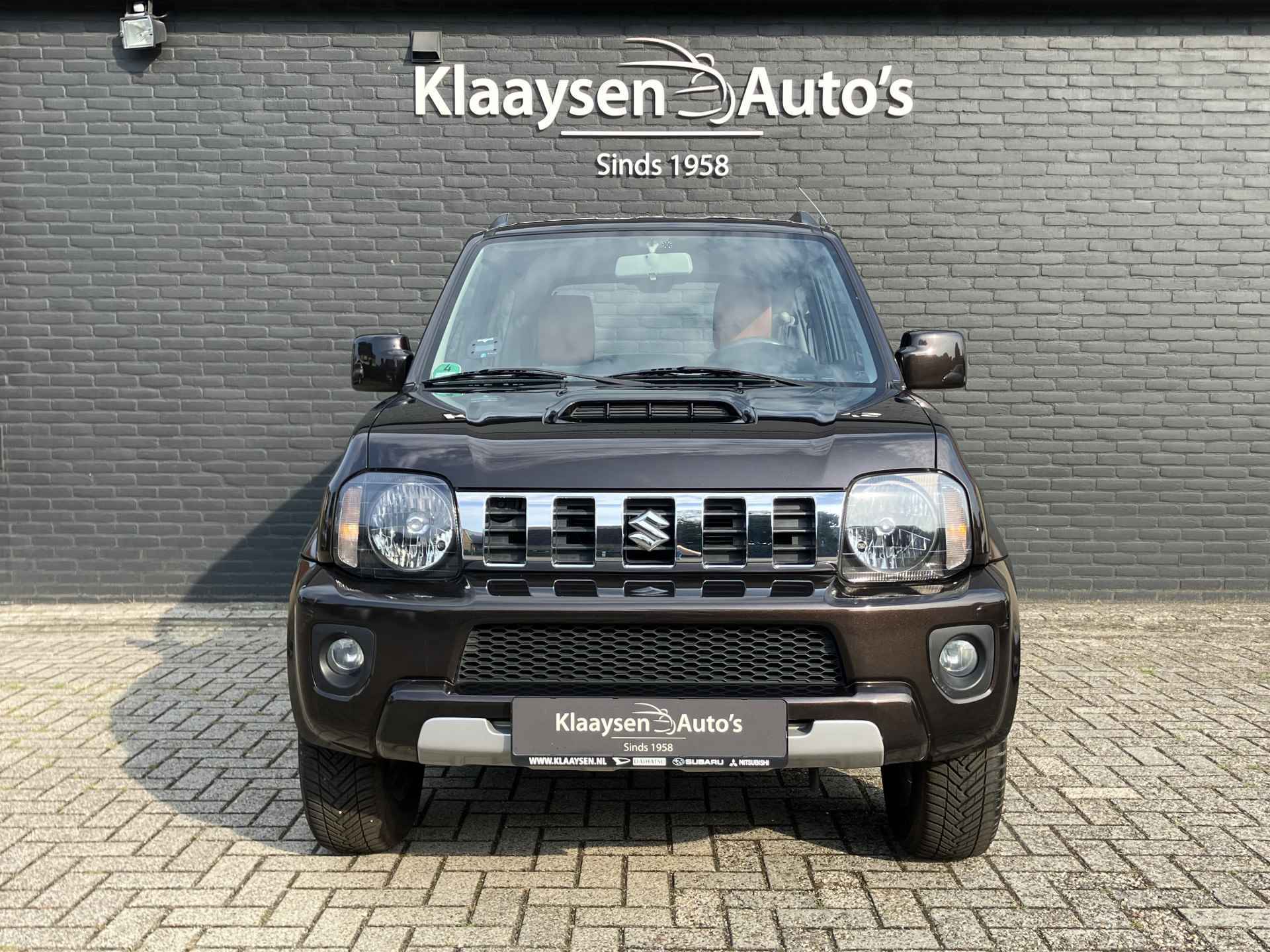 Suzuki Jimny 1.3 4WD Exclusive AUT. | dealer onderhouden | airco | navigatie | leder/alcantara bekleding | trekhaak | carplay - 3/32