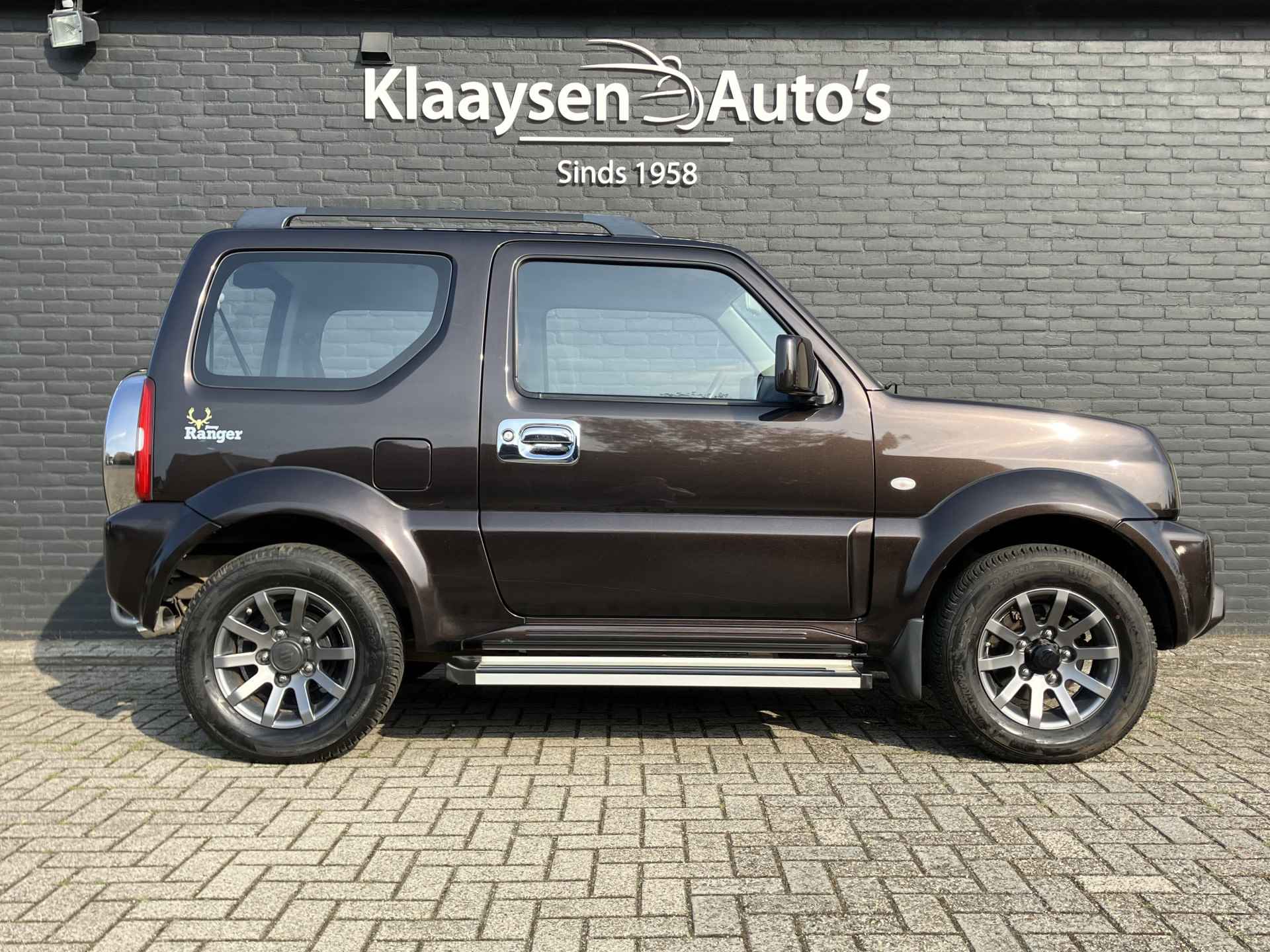 Suzuki Jimny 1.3 4WD Exclusive AUT. | dealer onderhouden | airco | navigatie | leder/alcantara bekleding | trekhaak | carplay - 5/32