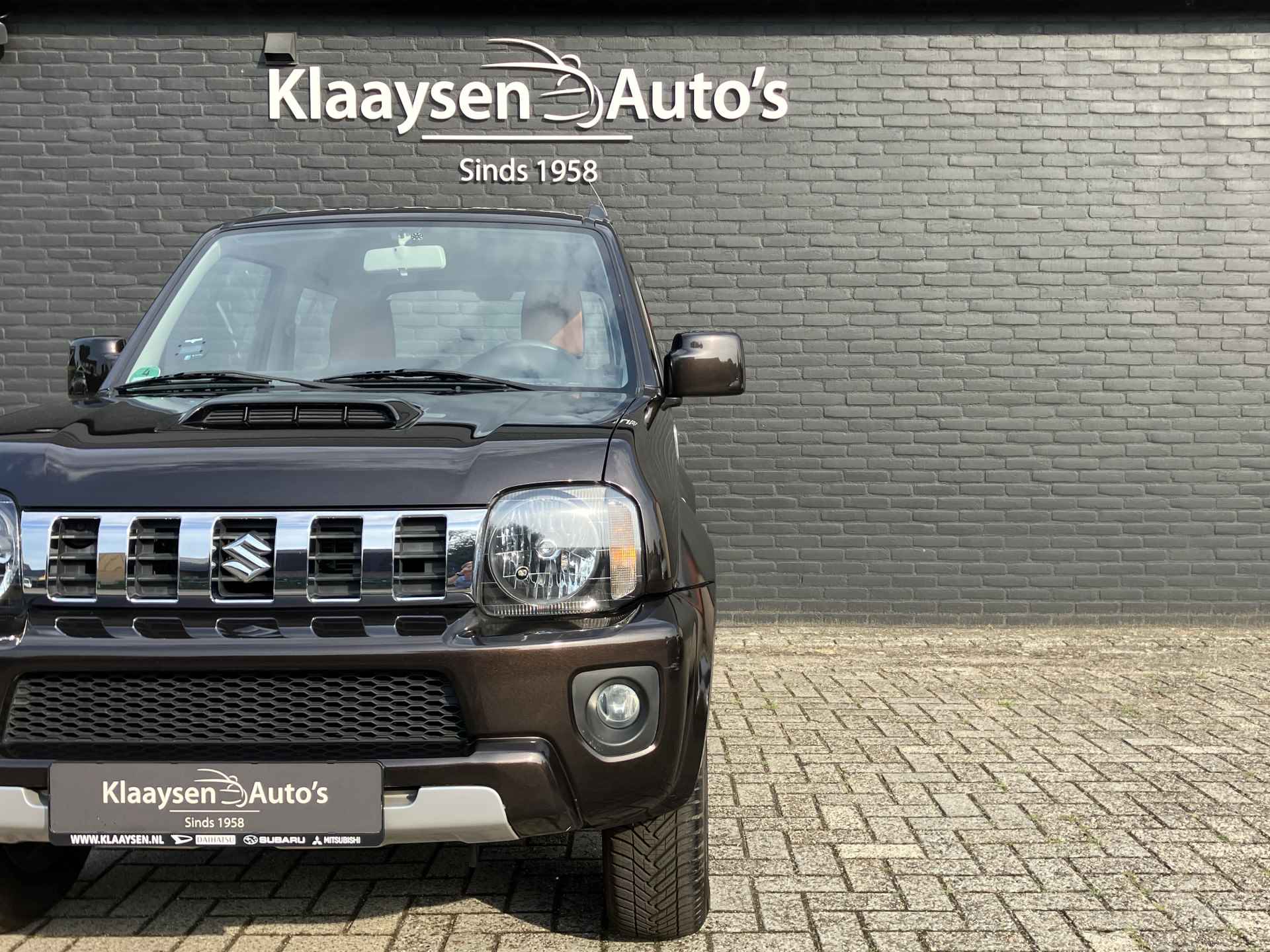 Suzuki Jimny 1.3 4WD Exclusive AUT. | dealer onderhouden | airco | navigatie | leder/alcantara bekleding | trekhaak | carplay - 10/32