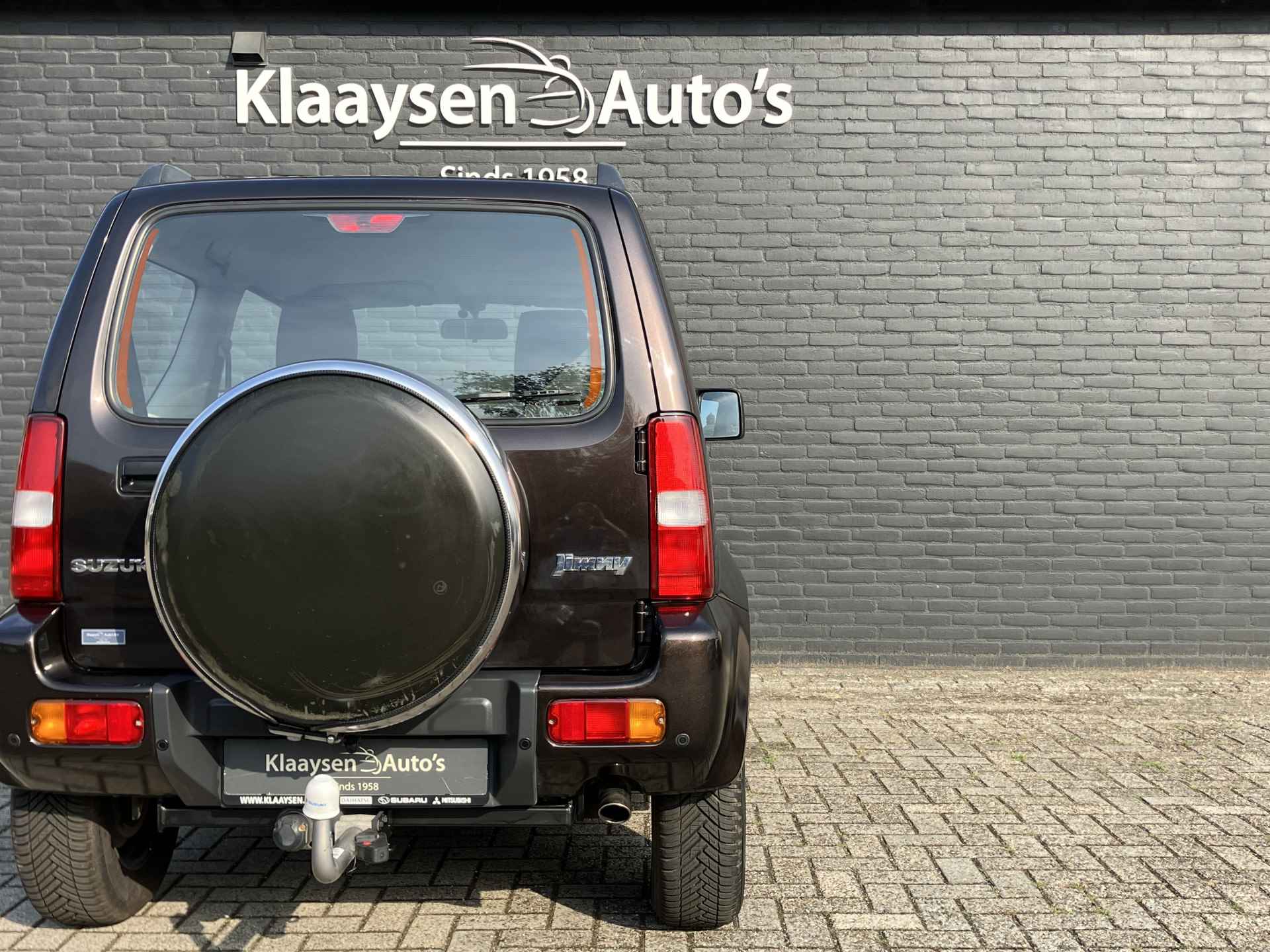 Suzuki Jimny 1.3 4WD Exclusive AUT. | dealer onderhouden | airco | navigatie | leder/alcantara bekleding | trekhaak | carplay - 12/32