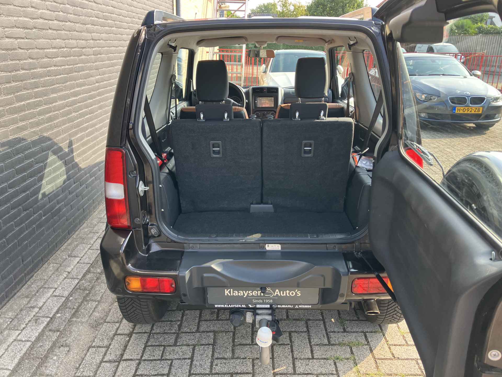 Suzuki Jimny 1.3 4WD Exclusive AUT. | dealer onderhouden | airco | navigatie | leder/alcantara bekleding | trekhaak | carplay - 20/32