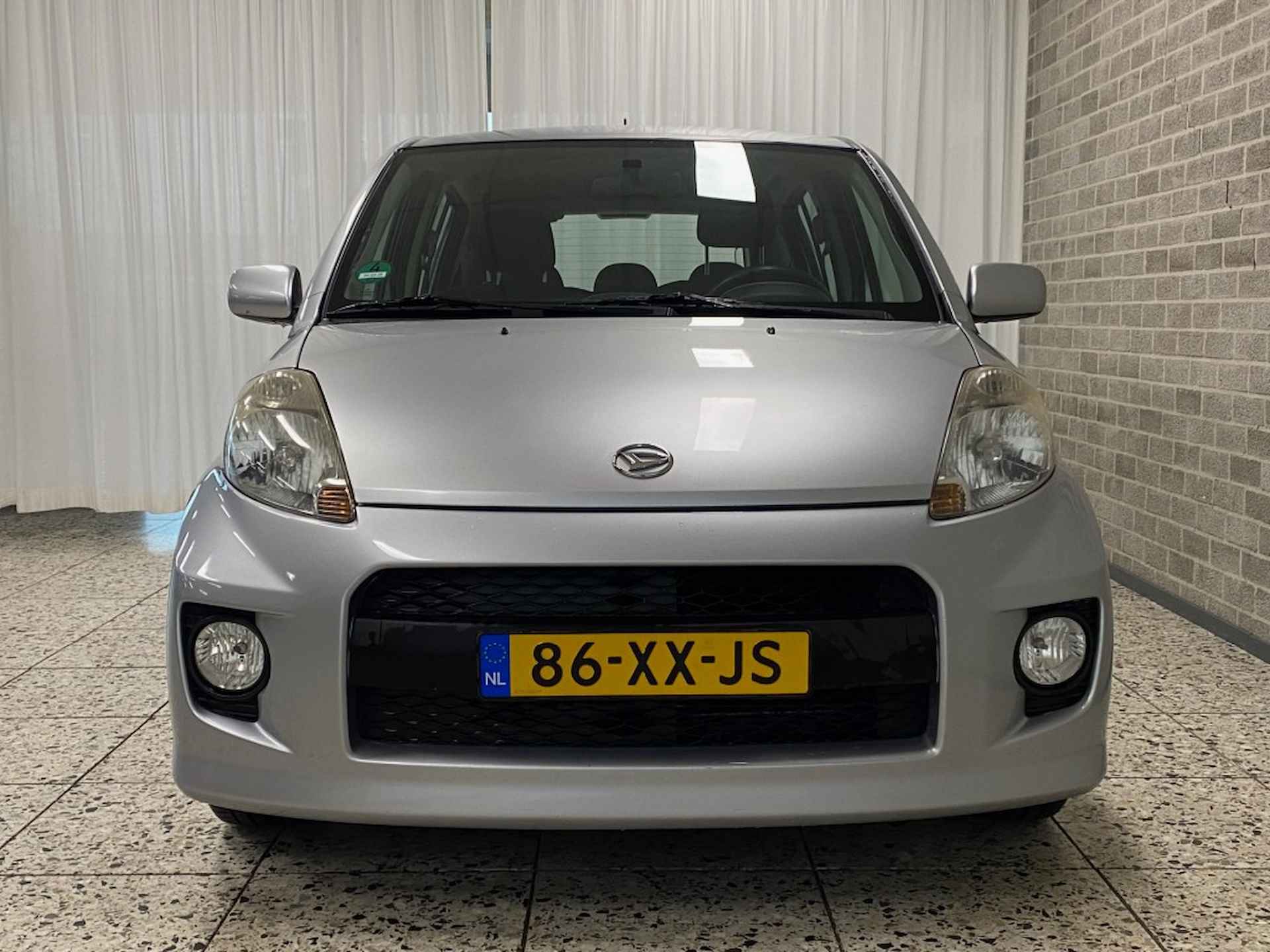 DAIHATSU Sirion 1.3 Sport Trekhaak/Airco/LM-velgen/C.V./Mistlampen/Achter spoile - 4/21