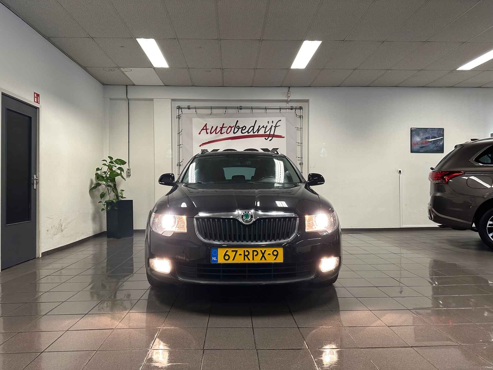 Skoda Superb Combi 1.4 TSI Comfort Business Line * Panoramadak / Navigatie / Leder / NL Auto * - 8/24