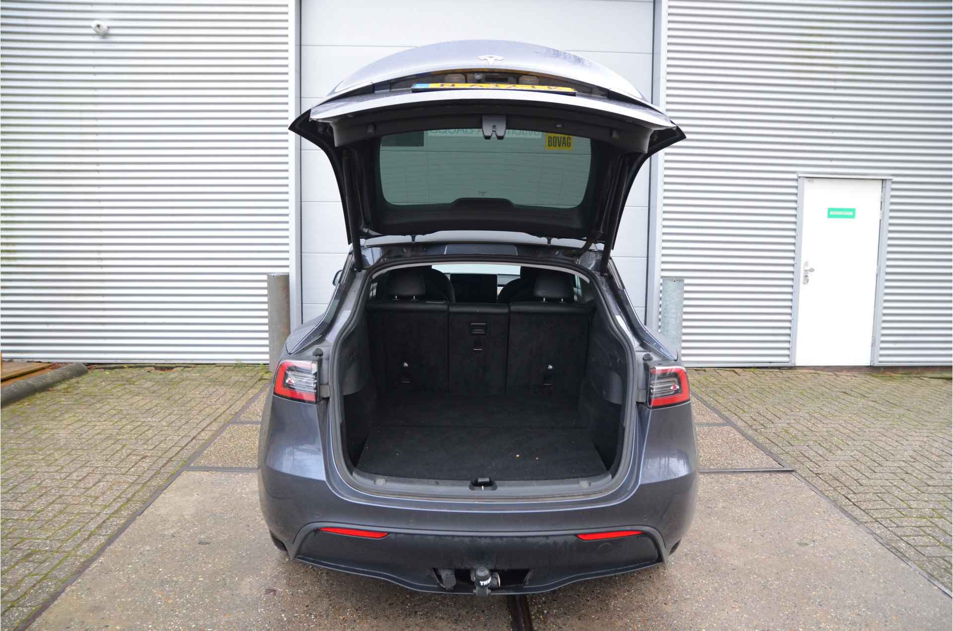 Tesla Model Y Long Range AWD 75 kWh Trekhaak, 20", AutoPilot+FSD (twv 7.500,-) - 32/34