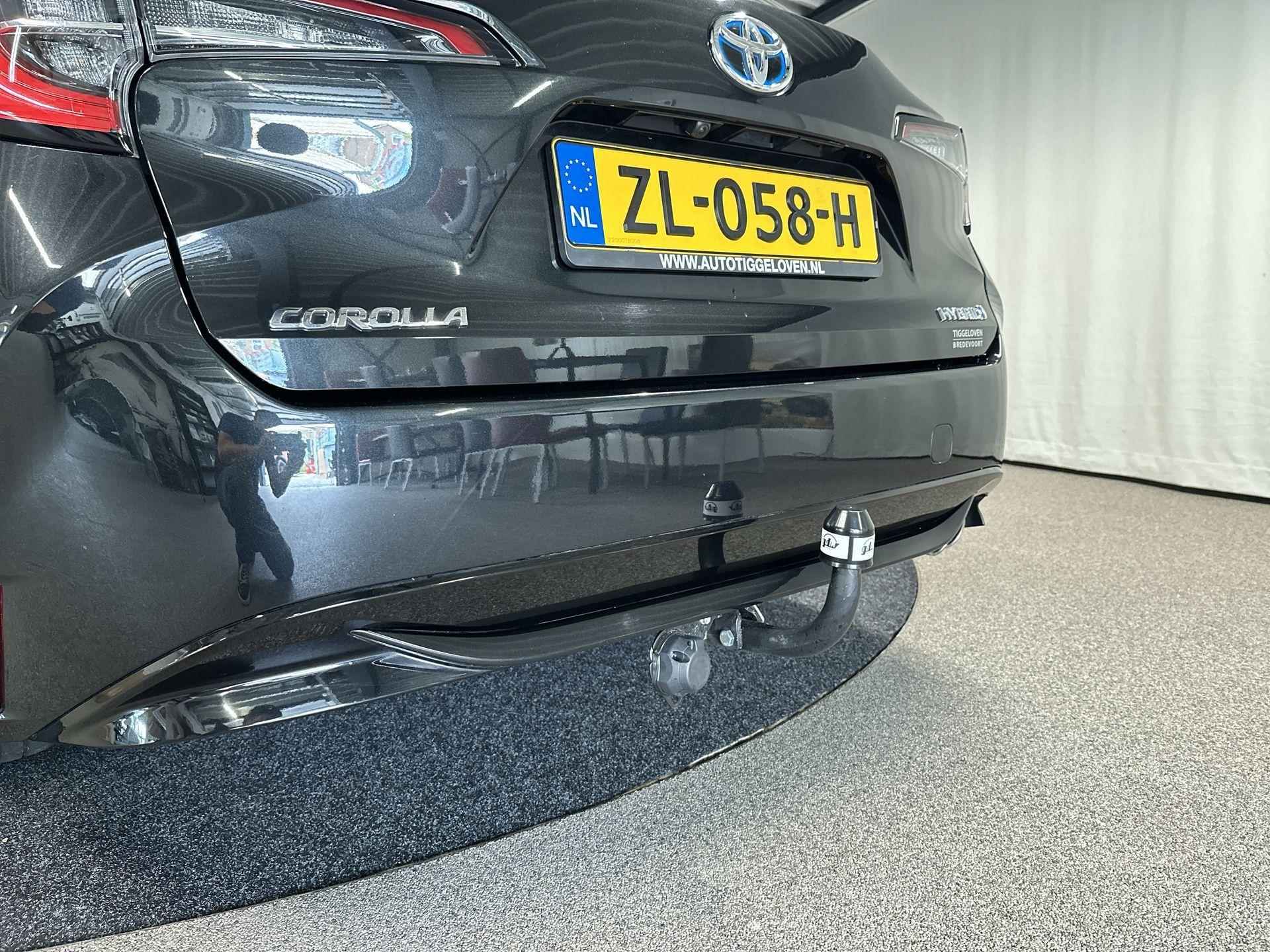 Toyota Corolla Touring Sports 2.0 Hybrid First Edition - 42/45