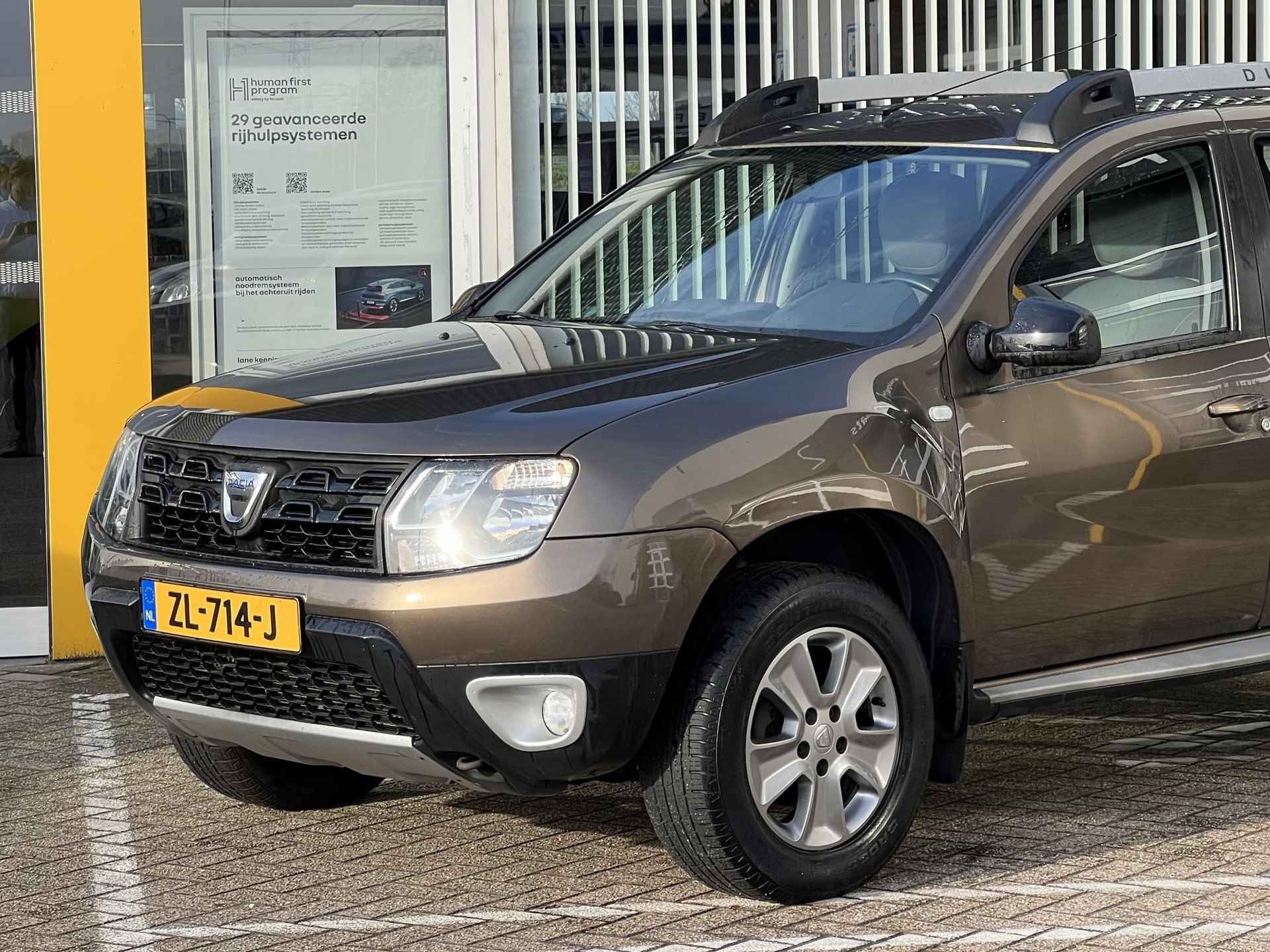 Dacia Duster 1.2 TCe 125 Lauréate | Trekhaak | Navigatie | Achteruitrijcamera | - 12/29