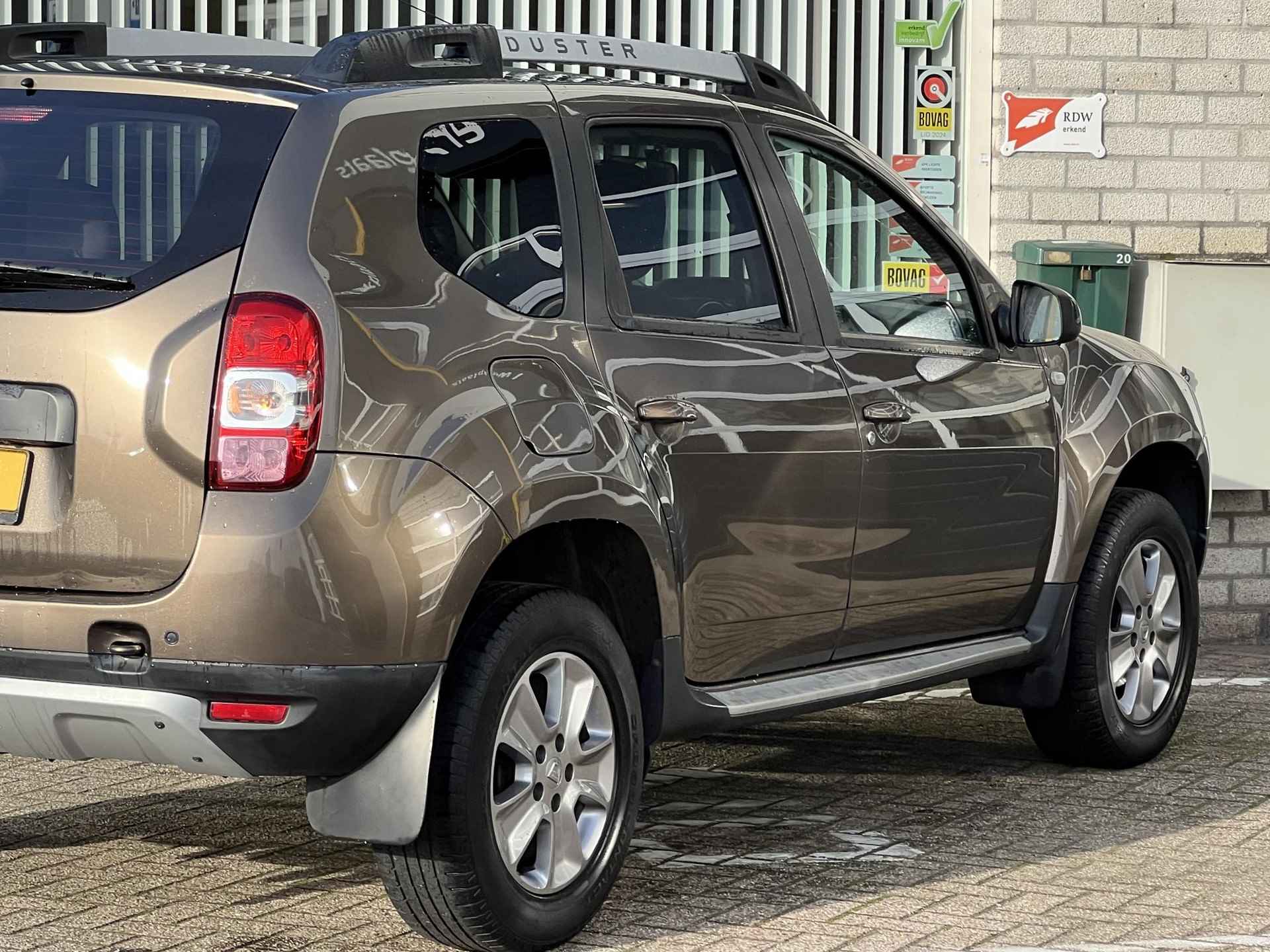 Dacia Duster 1.2 TCe 125 Lauréate | Trekhaak | Navigatie | Achteruitrijcamera | - 27/29