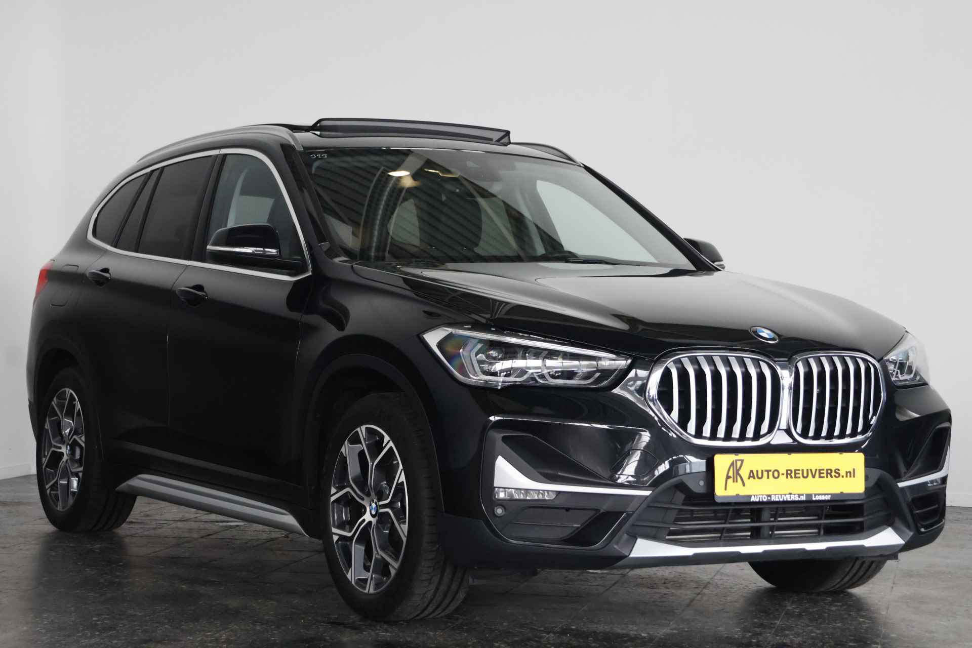 BMW X1 xDrive25e X-Line / Panorama / Opendak / Navi / DAB / LED / Trekhaak - 5/32