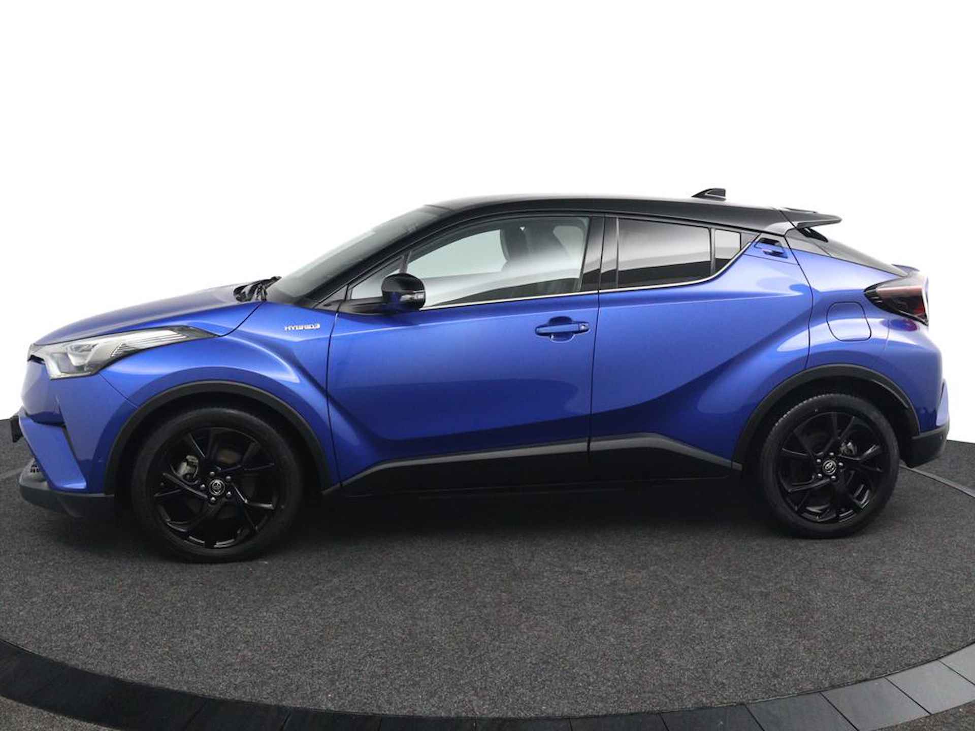 Toyota C-HR 1.8 Hybrid Style Ultimate | Trekhaak Afneembaar | Stof/ Kunstlederen Bekleding | Stuur en Stoelverwarming | Parkeersensoren Rondom | JBL Audio | - 6/47