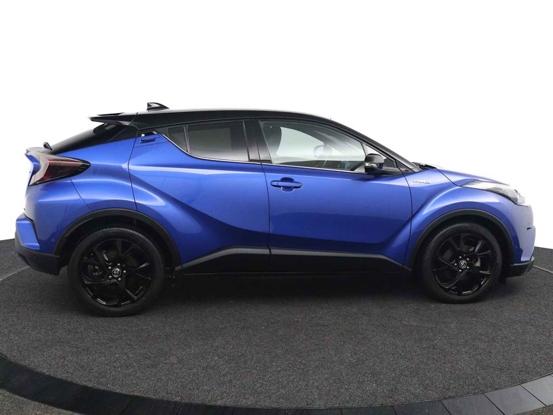 Toyota C-HR 1.8 Hybrid Style Ultimate | Trekhaak Afneembaar | Stof/ Kunstlederen Bekleding | Stuur en Stoelverwarming | Parkeersensoren Rondom | JBL Audio | - 7/47