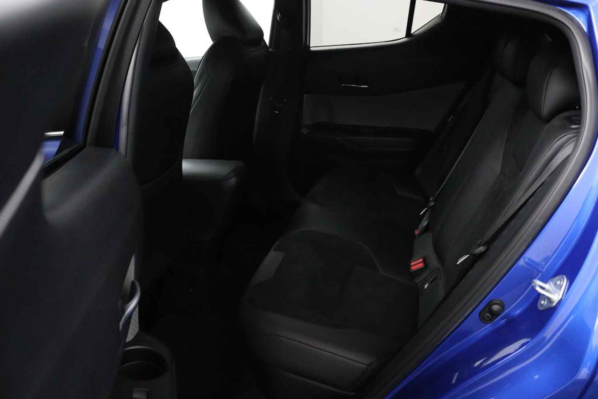 Toyota C-HR 1.8 Hybrid Style Ultimate | Trekhaak Afneembaar | Stof/ Kunstlederen Bekleding | Stuur en Stoelverwarming | Parkeersensoren Rondom | JBL Audio | - 13/47