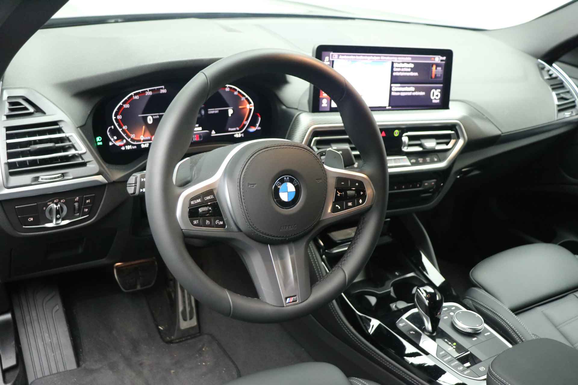 BMW X4 xDrive20i High Executive M Sport Automaat / Sportstoelen / Laserlight / Parking Assistant / M Sportonderstel / Live Cockpit Professional / Stoelverwarming - 14/24