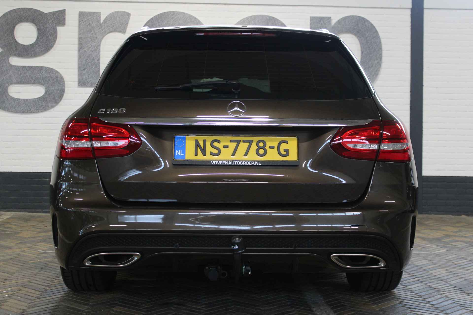 Mercedes-Benz C-Klasse Estate 180 AMG Sport Edition | Incl. 12 maanden garantie | Automaat | Afneembare trekhaak | Navigatie | Cruise control | Climate control | Vol leder | Stoelverwarming | Zwarte hemel | 18'' LM | Parkeersensoren | - 28/52