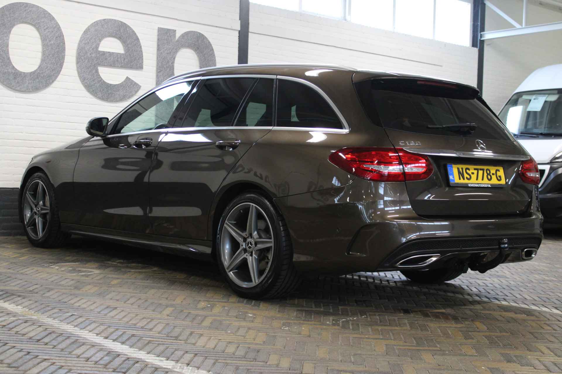 Mercedes-Benz C-Klasse Estate 180 AMG Sport Edition | Incl. 12 maanden garantie | Automaat | Afneembare trekhaak | Navigatie | Cruise control | Climate control | Vol leder | Stoelverwarming | Zwarte hemel | 18'' LM | Parkeersensoren | - 29/52