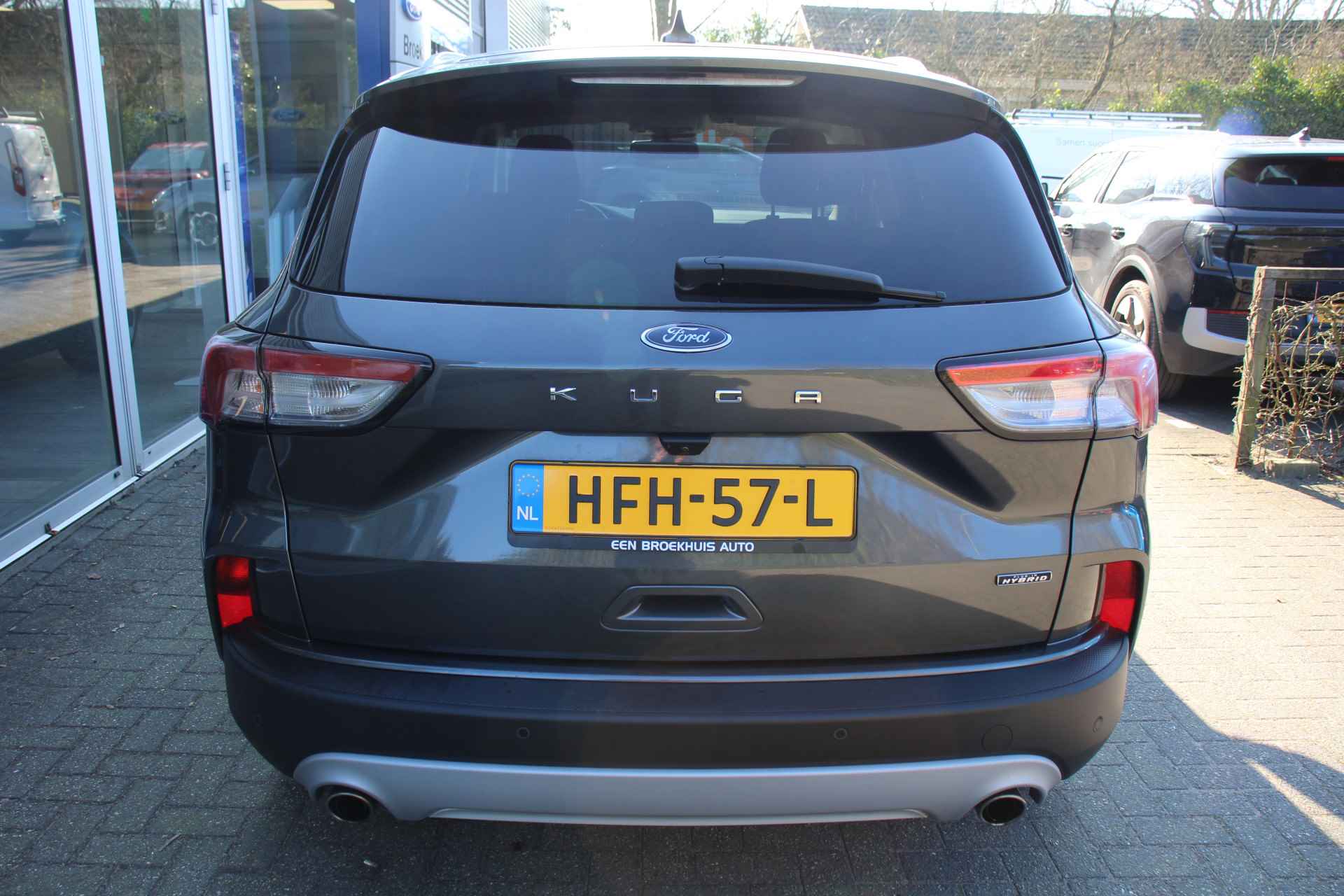 Ford Kuga 2.5 PHEV TITANIUM | DEALER OH! | WINTERPACK | ADAPT. CRUISE | AUTO. INPARKEREN | STOEL, STUUR & VOORRUITVERWARMING | CAMERA | NA - 40/50