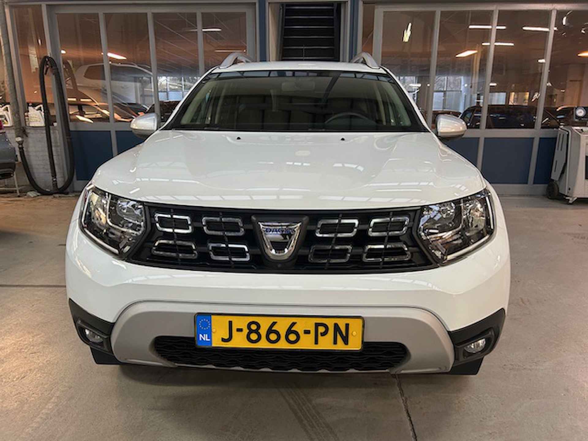 Dacia Duster 1.0 Tce 100pk 4x2 Prestige | Climate control | Sidebars | Navigatie | Camera | Pdc V+A  | Lm velgen | Cruise control | NAP | Rijklaar prijs! - 10/25