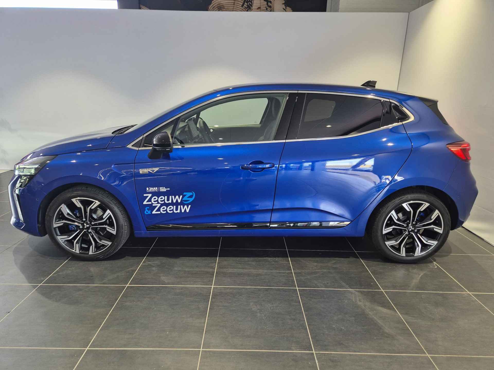 Mitsubishi Colt 1.6 HEV Instyle Hybrid | 8 Jaar garantie | Remklauwen in Carrosseriekleur | Zwart-Blauwe gordels | Full Options | Sportpedalen | Verlichte Instaplijsten | - 2/34