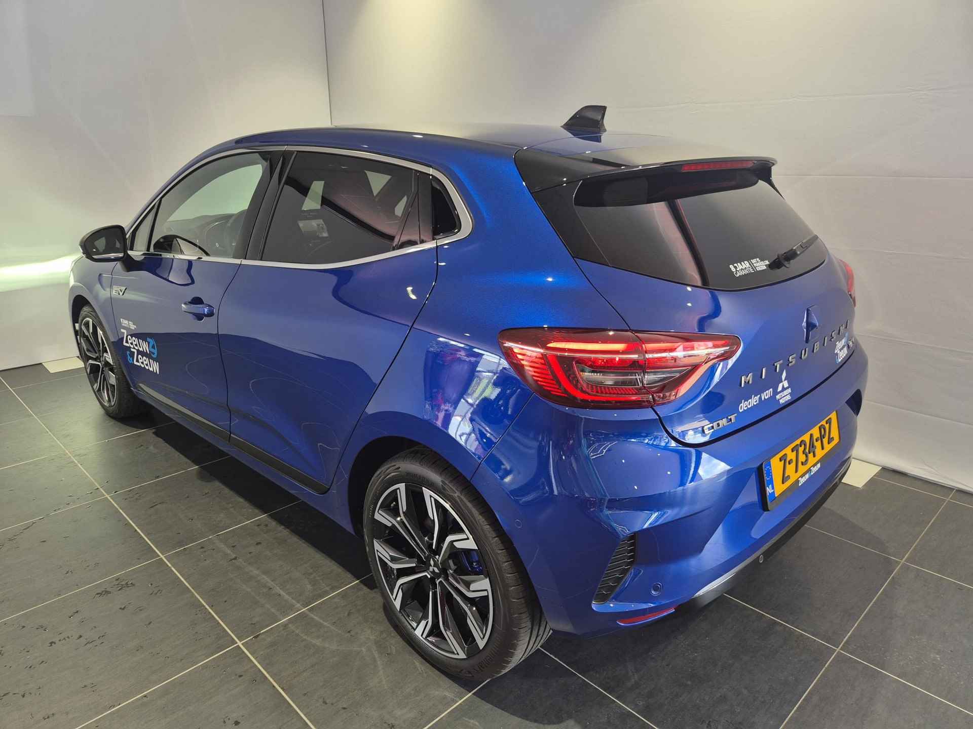 Mitsubishi Colt 1.6 HEV Instyle Hybrid | 8 Jaar garantie | Remklauwen in Carrosseriekleur | Zwart-Blauwe gordels | Full Options | Sportpedalen | Verlichte Instaplijsten | - 3/34