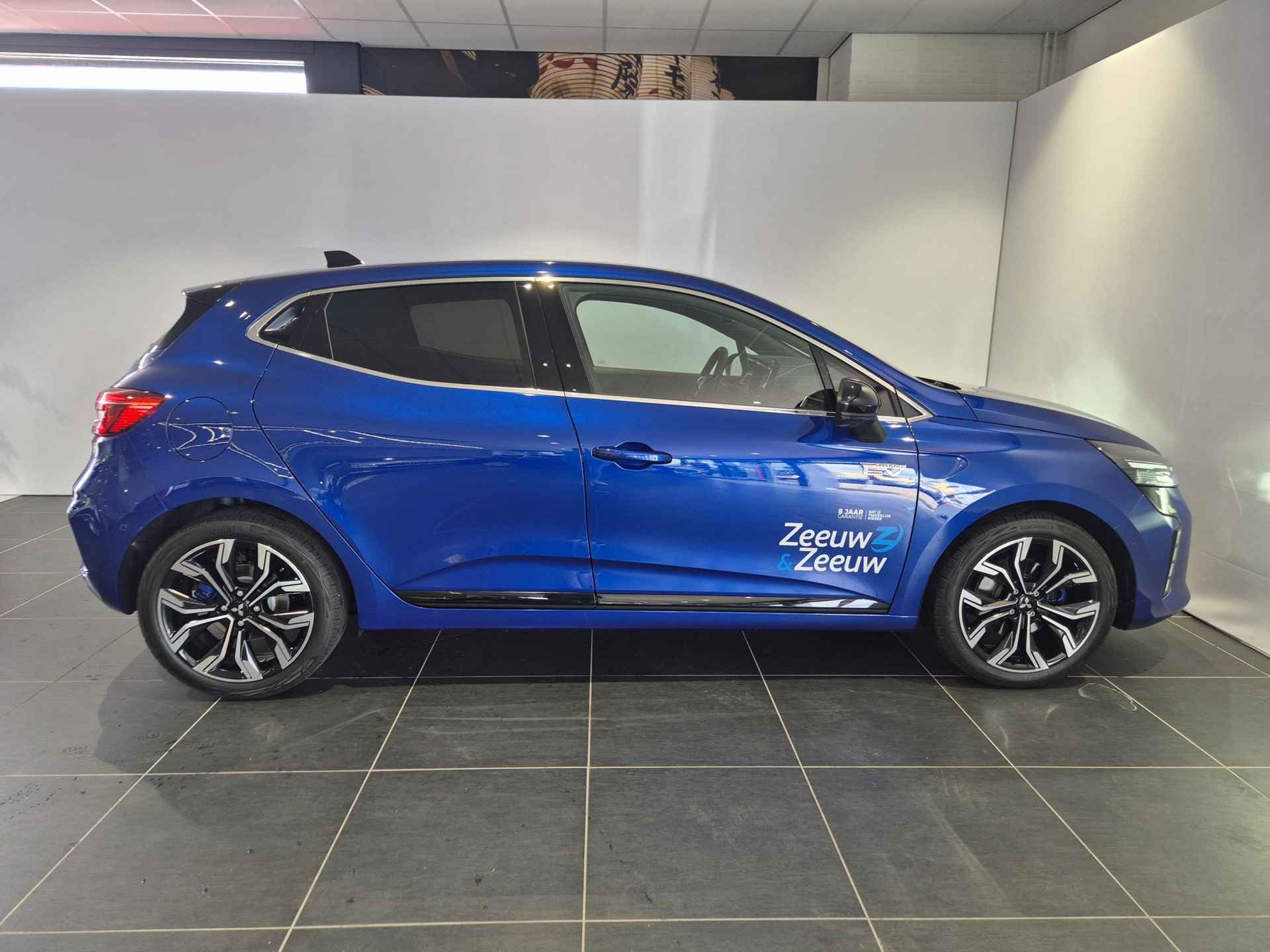 Mitsubishi Colt 1.6 HEV Instyle Hybrid | 8 Jaar garantie | Remklauwen in Carrosseriekleur | Zwart-Blauwe gordels | Full Options | Sportpedalen | Verlichte Instaplijsten | - 6/34