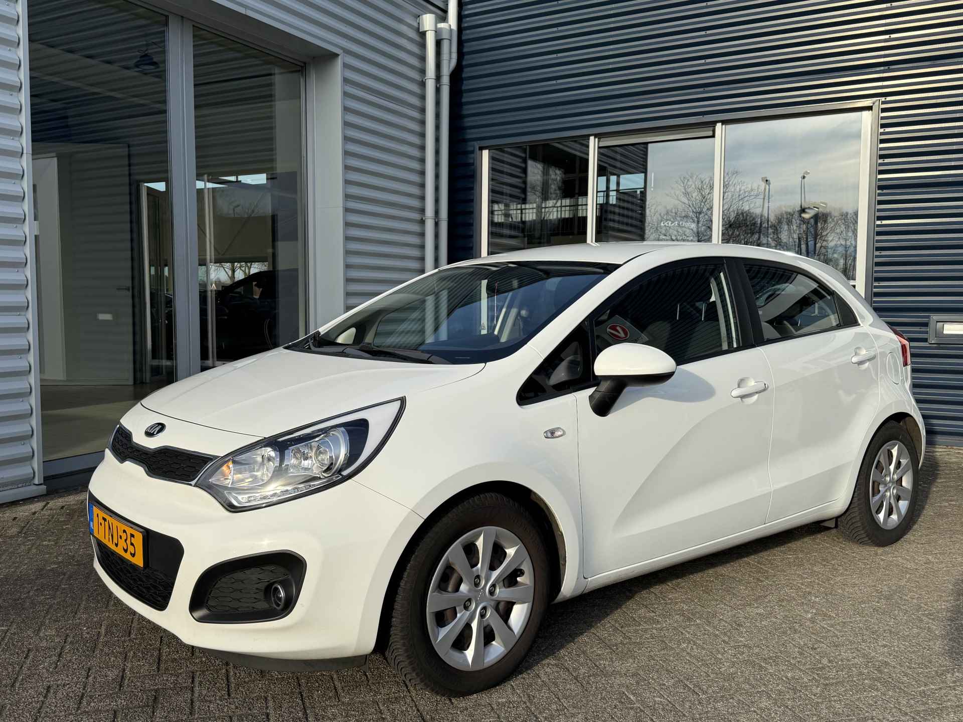 Kia Rio 1.2 CVVT BusinessLine - Net Binnen! - Trekhaak -  All Seasons - Cruise Control - Airco - Bluetooth - Bovag Garantie - 3/21