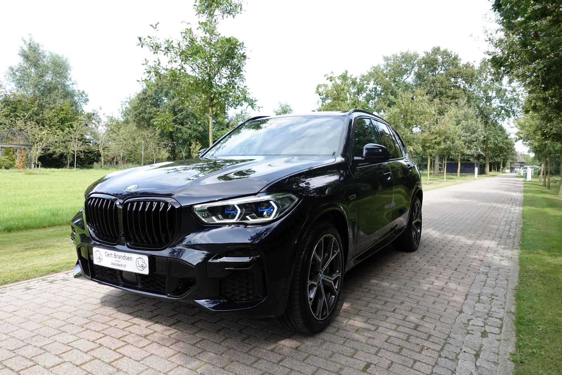 BMW X5 xDrive45e High Executive Luchtvering Pano Individuel - 1/49