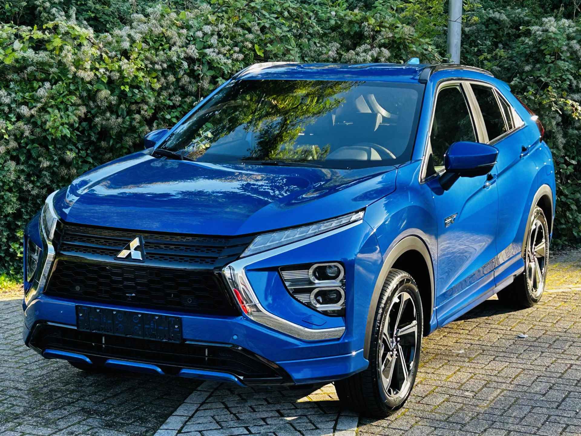 Mitsubishi Eclipse Cross 2.4 PHEV Executive | € 8000,- VOORRAAD KORTING | op = op  AUTOMAAT | APPLE/ANDROID AUTO  | CRUISE | CLIMATE | NAVI , STOELVERWARMING . - 25/30