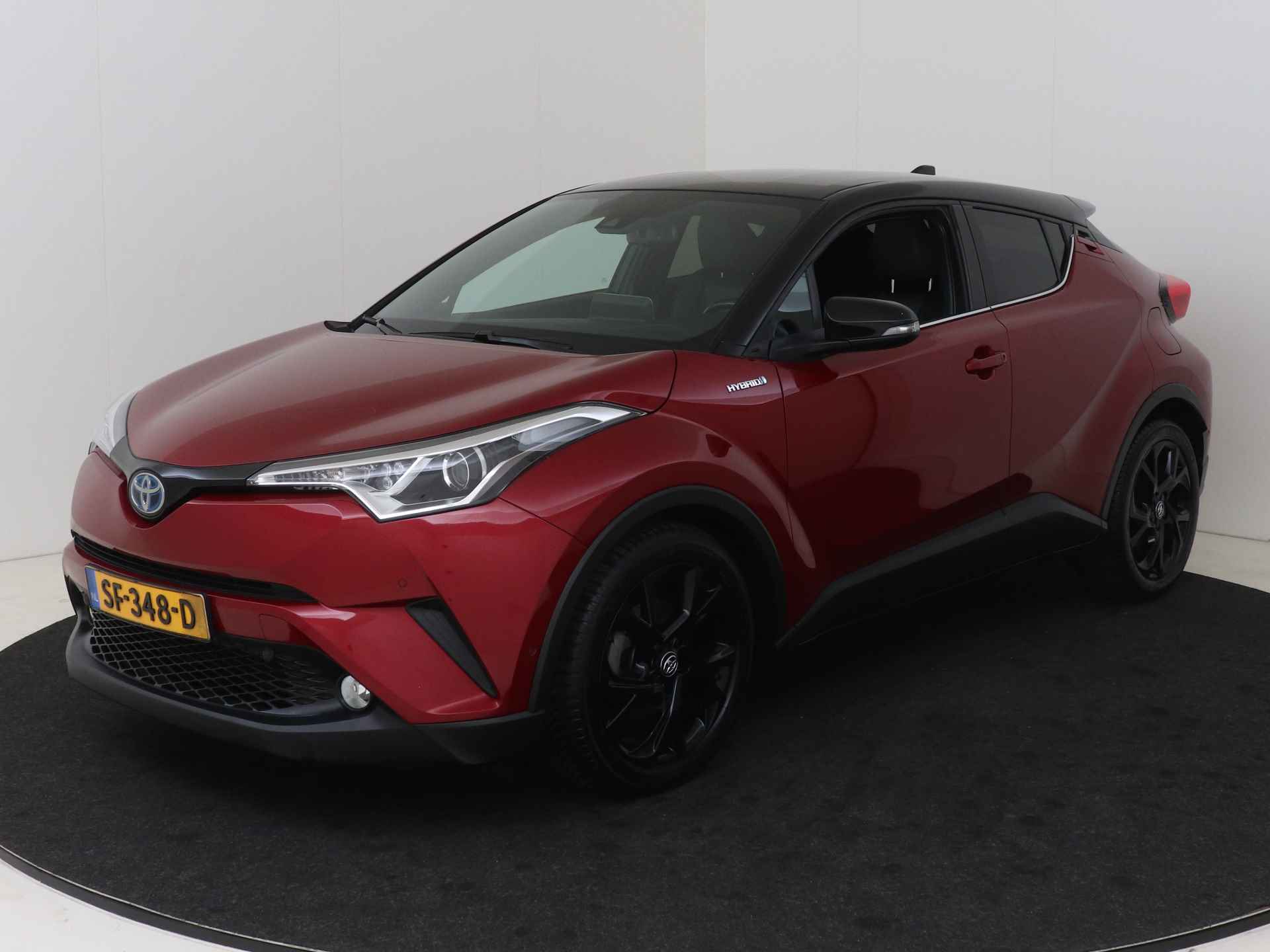 Toyota C-HR 1.8 Hybrid Black Edition I Navigatie I Climate Control I Cruise Control I Camera I Trekhaak Afneembaar I 2e Eigenaar I Dealer Onderhouden I Stoelverwarming Voor I Keyless Entry/Start I Subwoofer I - 28/48