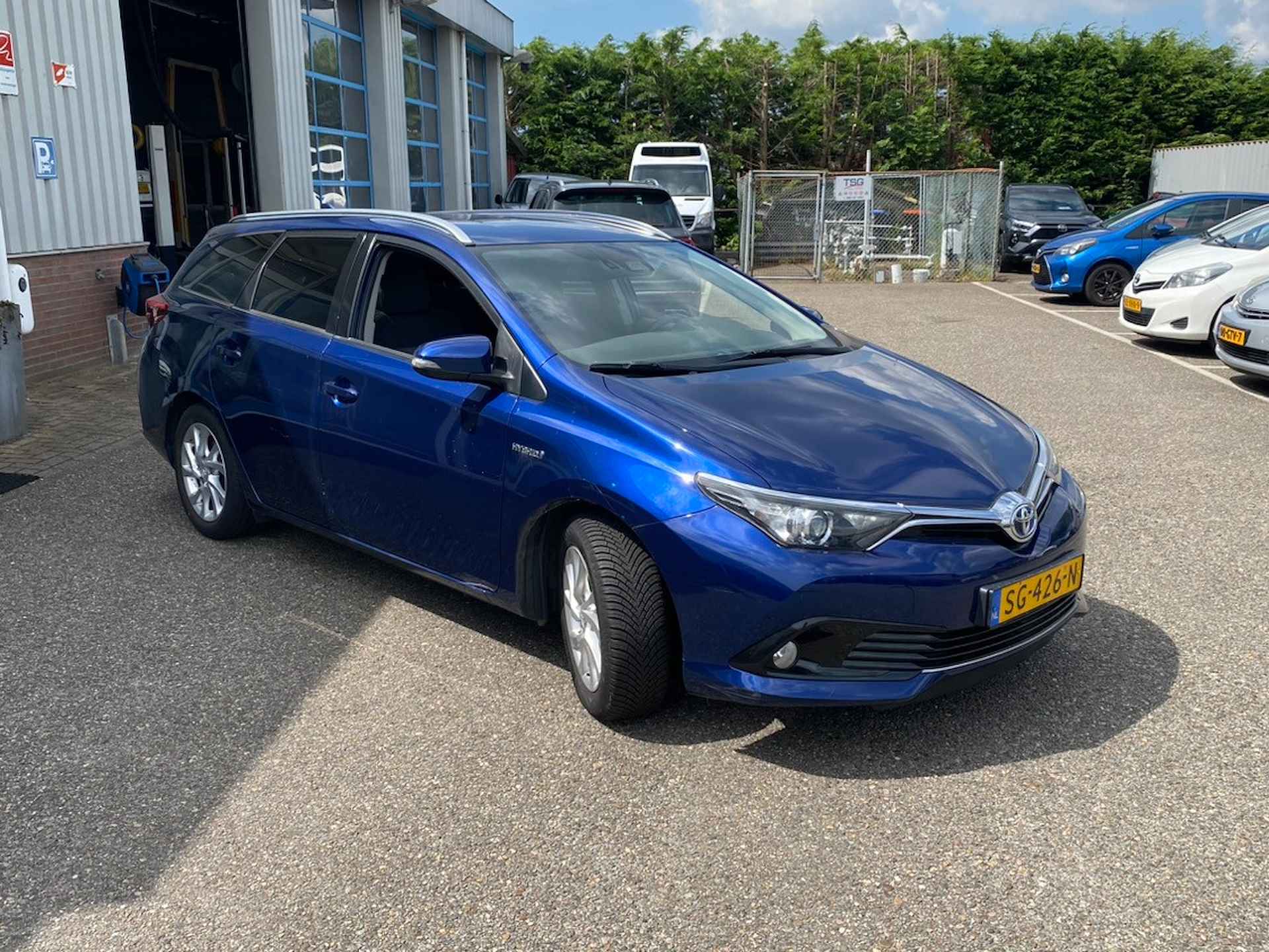 Toyota Auris Touring Sports 1.8 Hybrid Dynamic + Trekhaak - 29/32