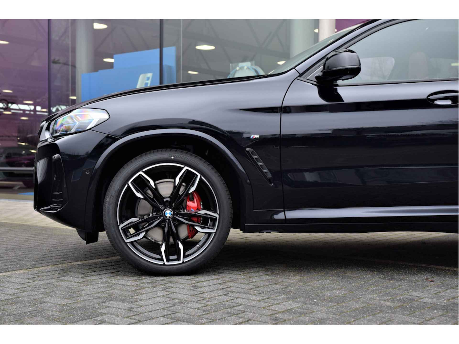 BMW X4 M40i High Executive Automaat / Panoramadak / Trekhaak / Laserlight / Parking Assistant Plus / Head-Up / Driving Assistant Professional / Comfort Access - 14/36