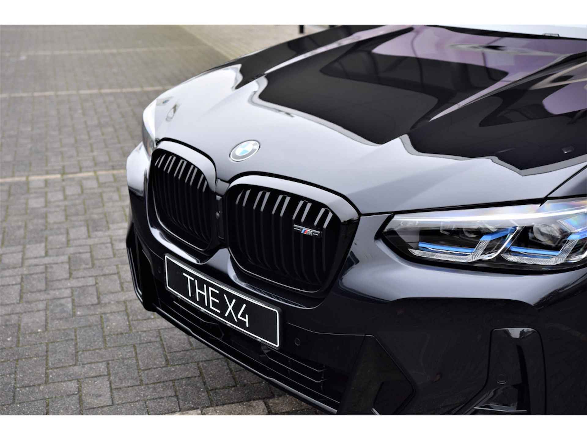 BMW X4 M40i High Executive Automaat / Panoramadak / Trekhaak / Laserlight / Parking Assistant Plus / Head-Up / Driving Assistant Professional / Comfort Access - 16/36