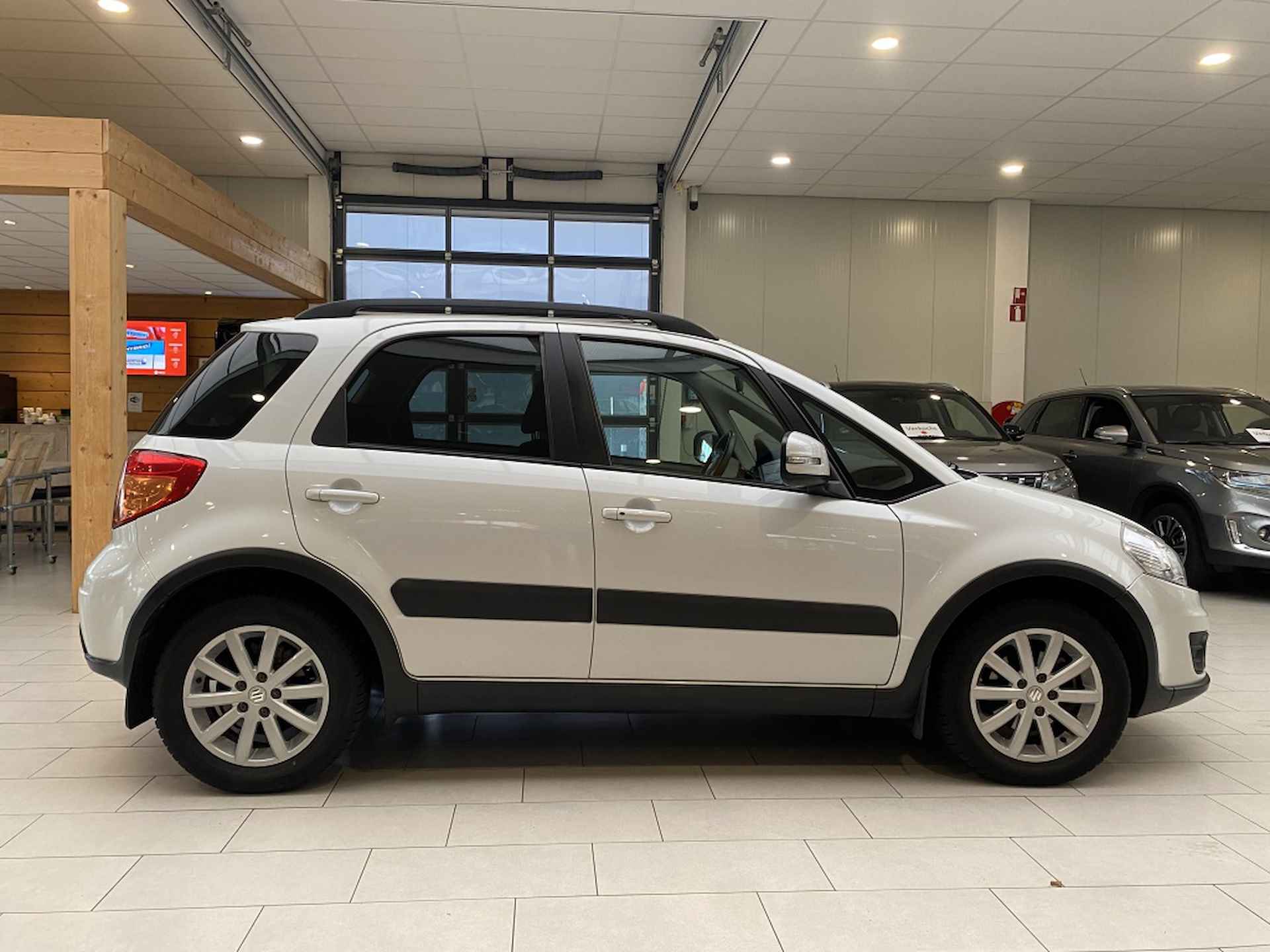 Suzuki SX4 1.6 Executive [CLIMATE CONTROL | NAVIGATIE] - 9/24