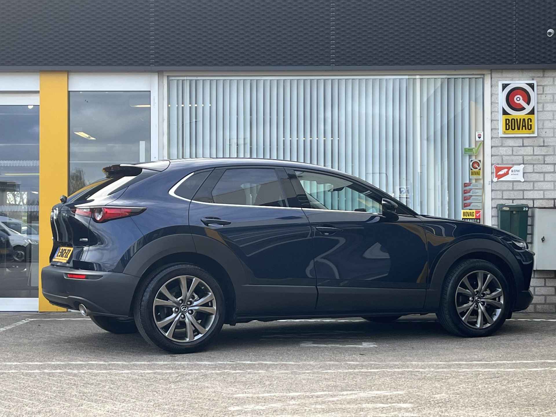 Mazda CX-30 2.0 e-SkyActiv-X 180 Luxury , NL-Auto, 1e eigenaar, Full Option!, LEDER, Cruise adaptief, Stoel & stuur verwarming, Elektrsiche achterklep, Geheugen functie, Camera, Parkeersensoren - 28/34