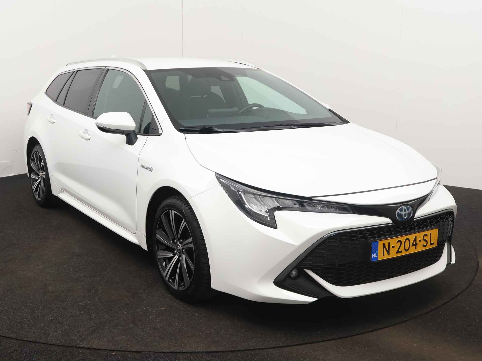 Toyota Corolla Touring Sports 1.8 Hybrid Dynamic | Camera | Climate Control | LM velgen | Cruise Control Adaptief | Stoelverwarming | Draadloze telefoonlader | - 29/43