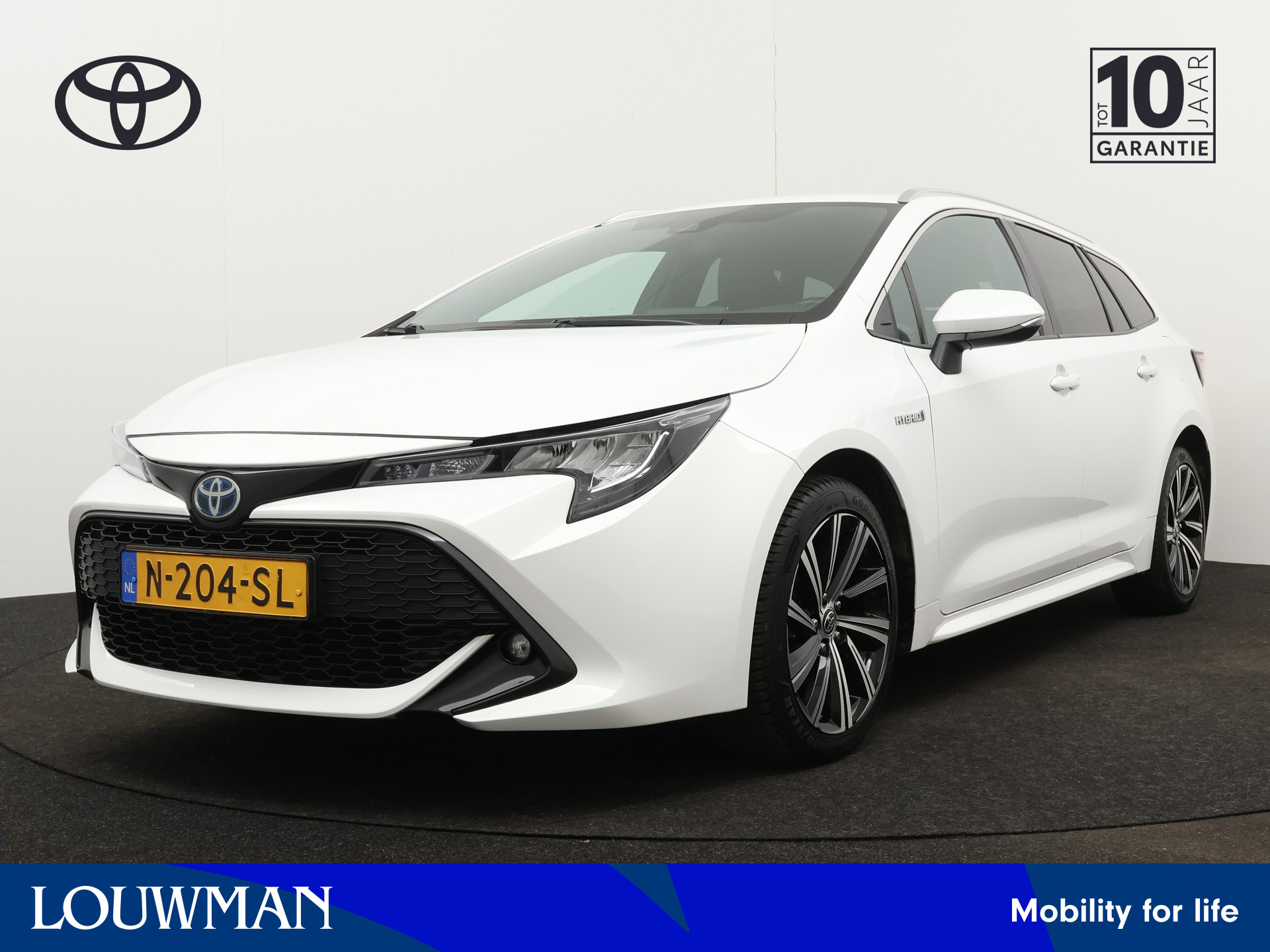 Toyota Corolla Touring Sports 1.8 Hybrid Dynamic | Camera | Climate Control | LM velgen | Cruise Control Adaptief | Stoelverwarming | Draadloze telefoonlader |