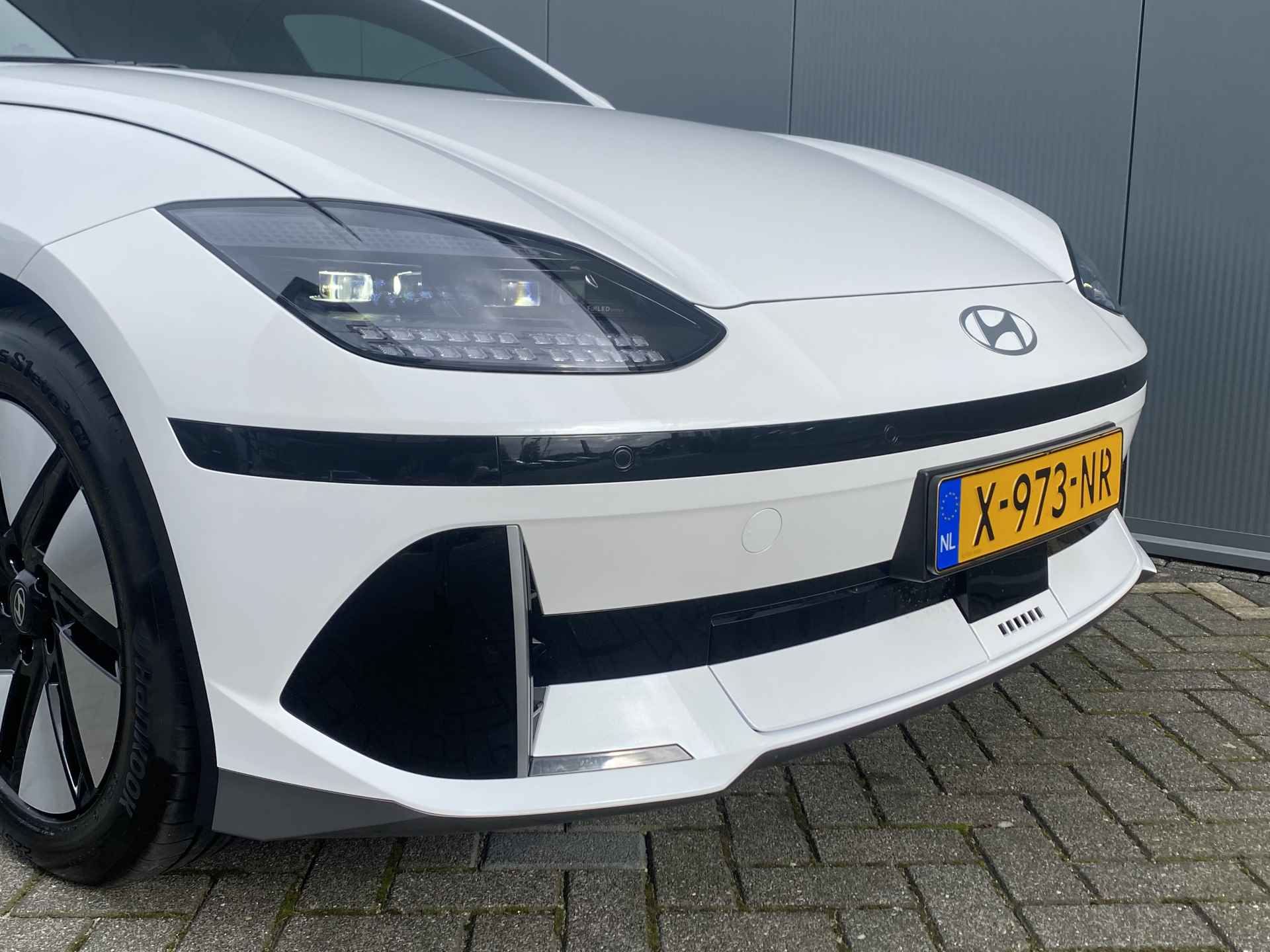 Hyundai IONIQ 6 77 kWh 229pk Connect | Camera | Climate | Keyless | Navigatie | Elek. Klep | Full - Led | Parelmoer | Warmtepomp | Winterpakket - 12/35