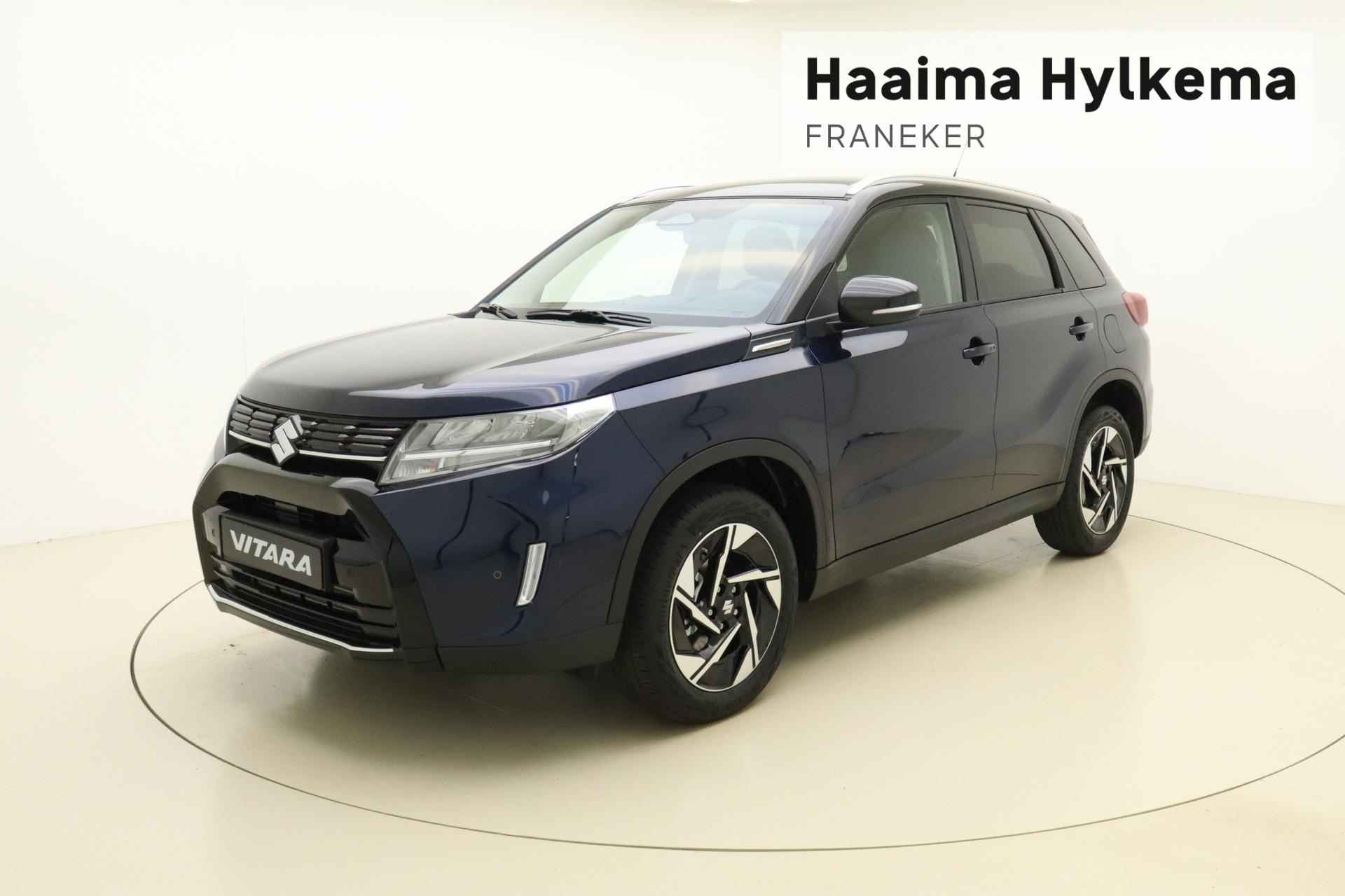 Suzuki Vitara 1.4 Boosterjet Style Smart Hybrid | Nieuw 2024 | Achteruitrijcamera | Cruise control | Navigatie | Parkeersensoren | Stoelverwarming - 1/32