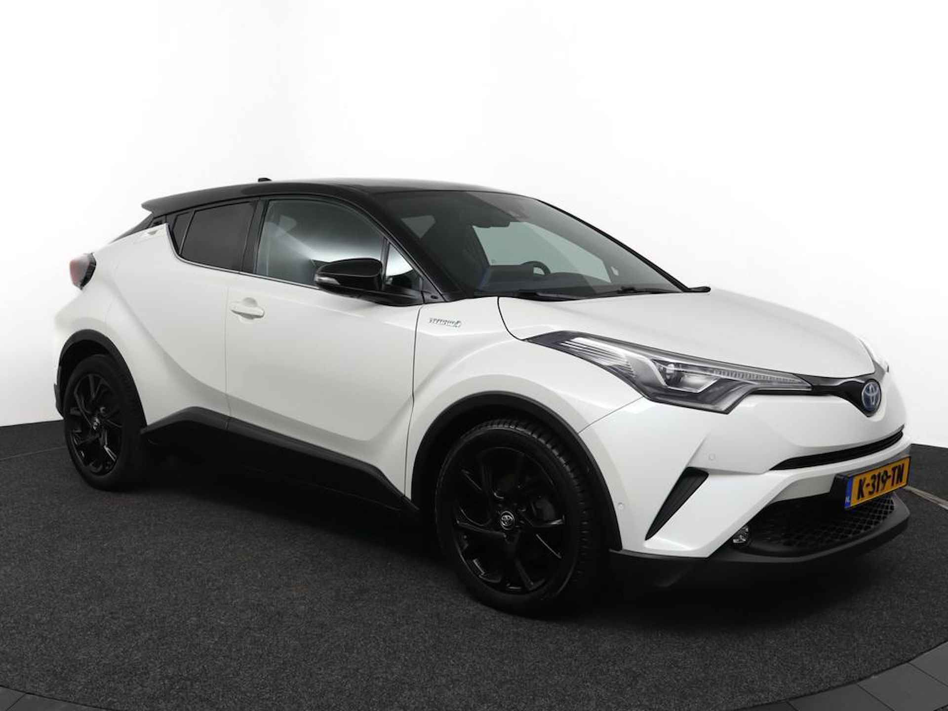 Toyota C-HR 1.8 Hybrid Bi-Tone | LED verlichting | Adaptive Cruise Control | Lederen bekleding | Stoelverwarming | Stuurverwarming | - 14/52