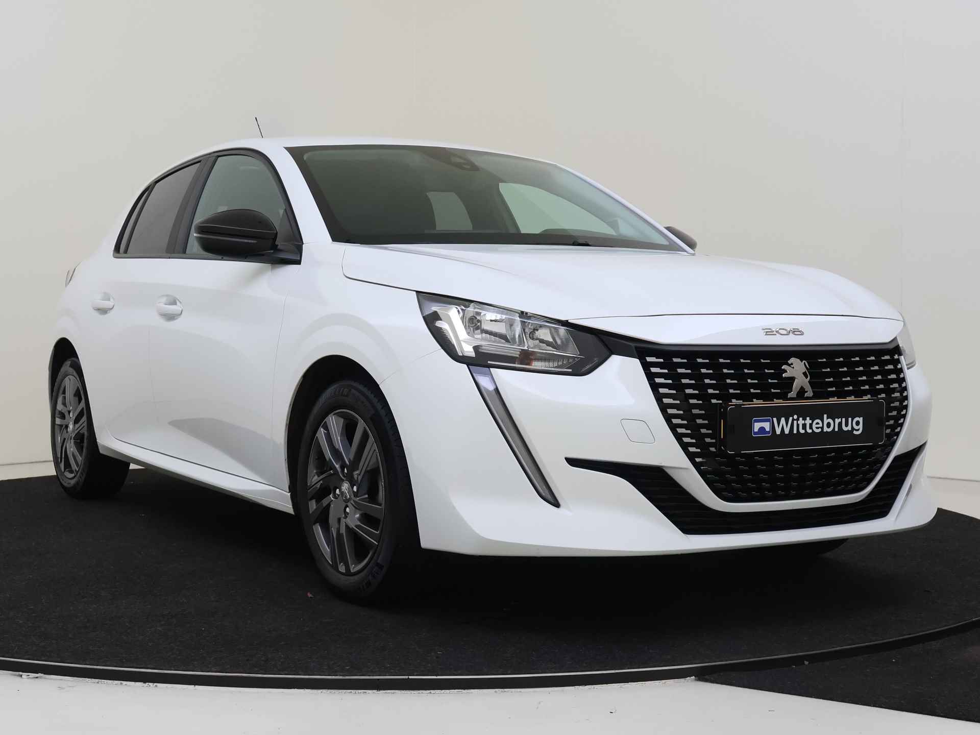 Peugeot 208 1.2 PureTech Active Pack | Navigatie | Lichtmetalen Velgen | Cruise Control | Parkeersensoren - 4/41