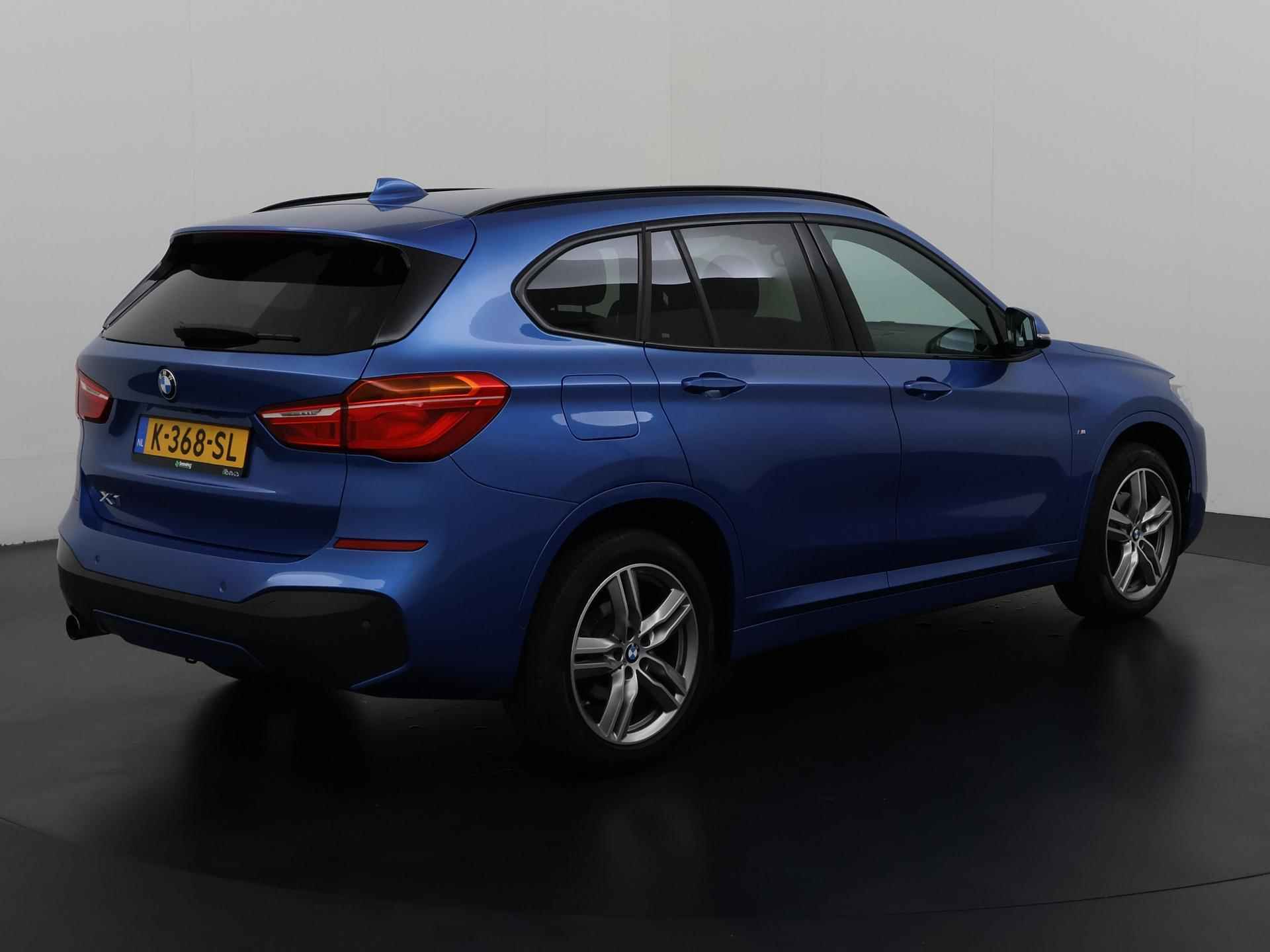 BMW X1 sDrive18i Centennial High Executive | Trekhaak | Camera | Leder | Zondag Open! - 4/38