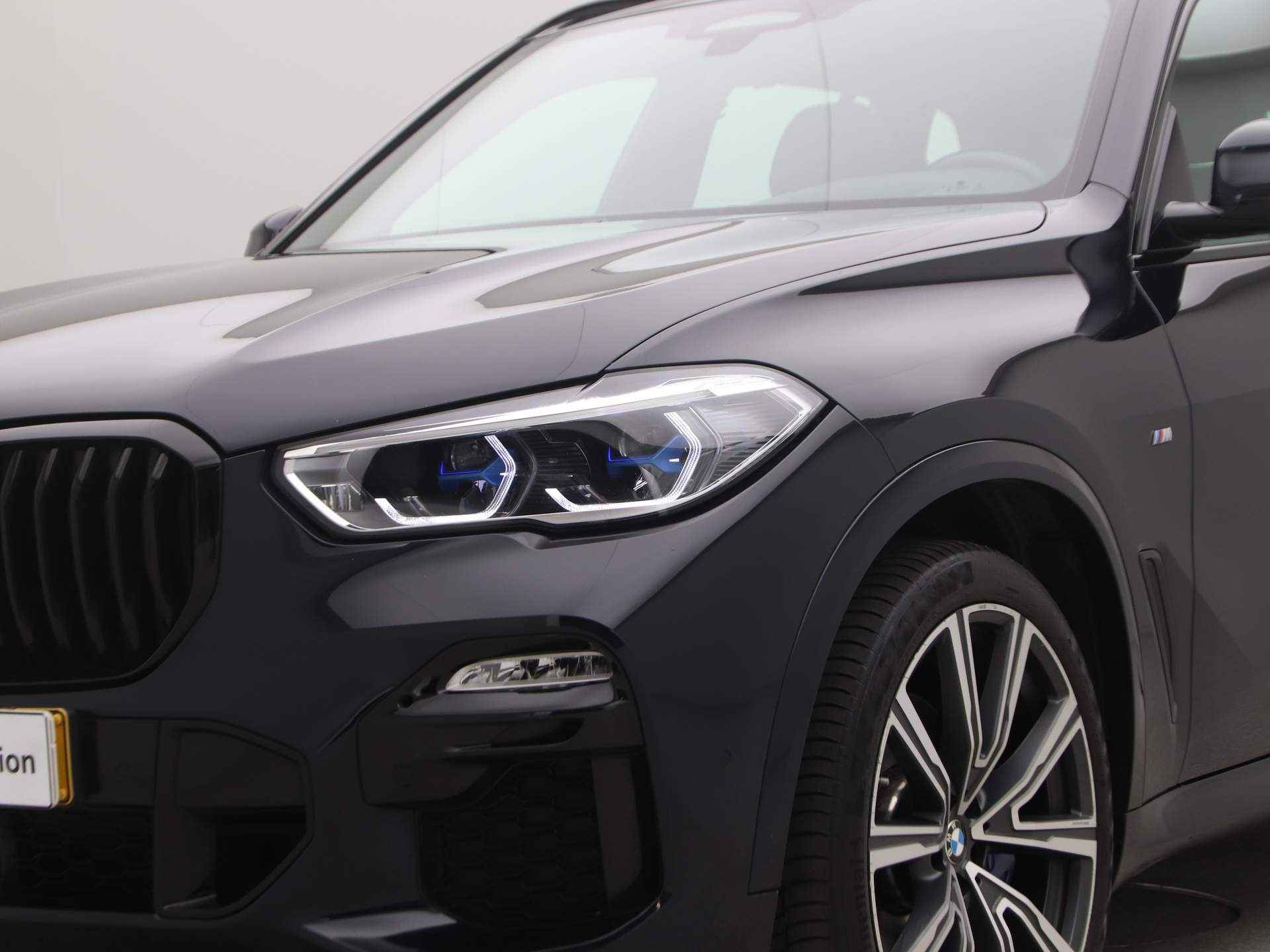 BMW X5 xDrive 30d High Executive M-Sport Derde zitrij - 25/27