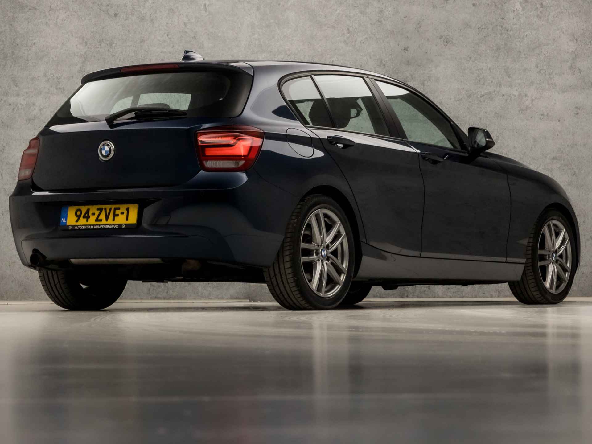 BMW 1-serie 116i Sportline (GROOT NAVI, CLIMATE, M STUUR, M SPORT ONDERSTEL, STOELVERWARMING, LEDEREN SPORTSTOELEN, XENON, CRUISE, NIEUWE APK, NIEUWSTAAT) - 5/35