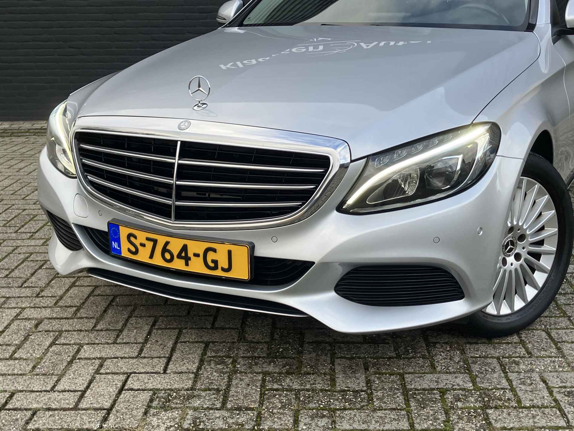 Mercedes-Benz C-Klasse Estate 180 Prestige AUT. | dealer onderhouden | navigatie | sportstoelen | elektr. a. klep | stoelverwarming - 13/38